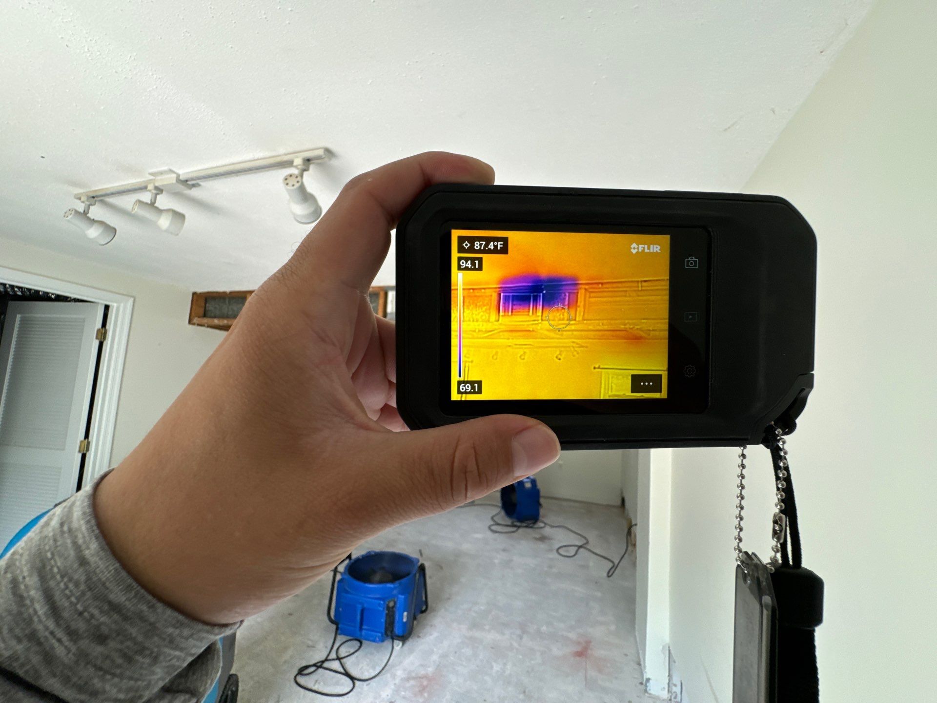 Moisture monitoring continues across building materials during restoration drying phase.