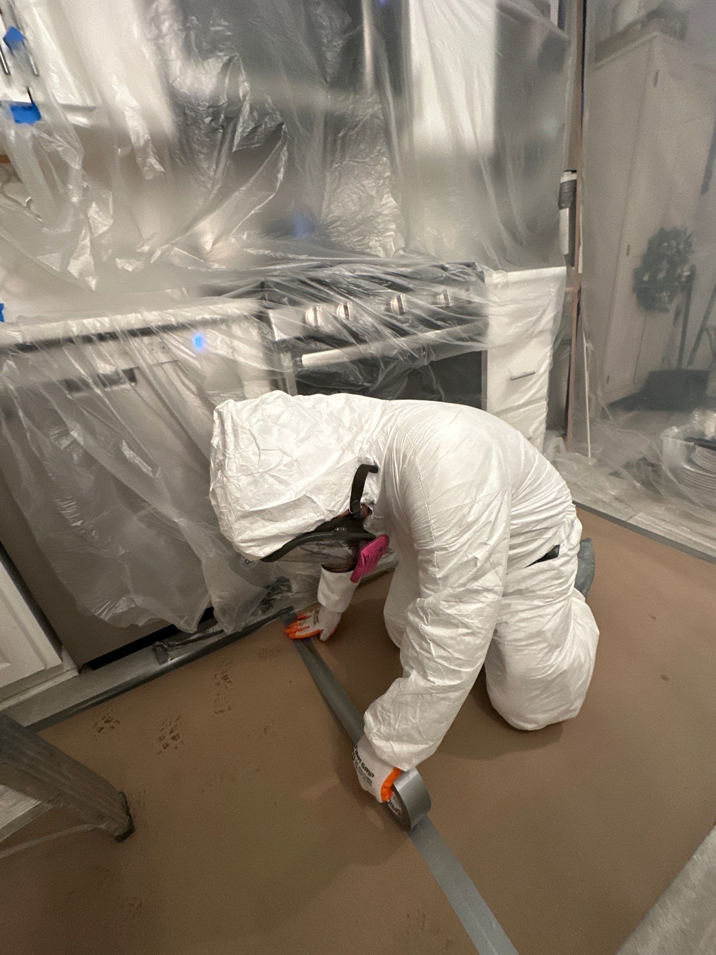 Structural drying equipment positioned within sealed containment during mold remediation process.