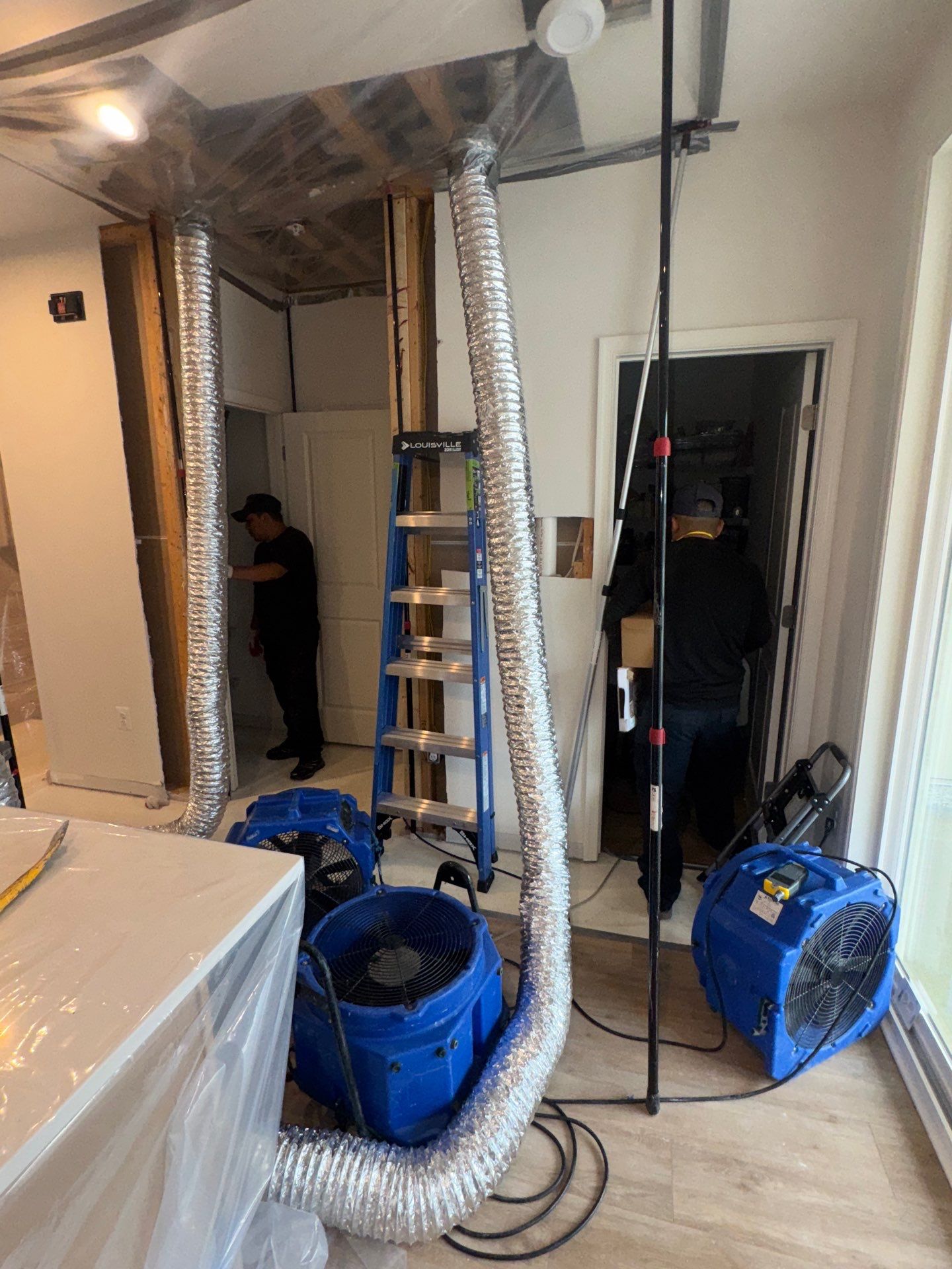 Ceiling repair underway following completion of structural drying and moisture remediation.