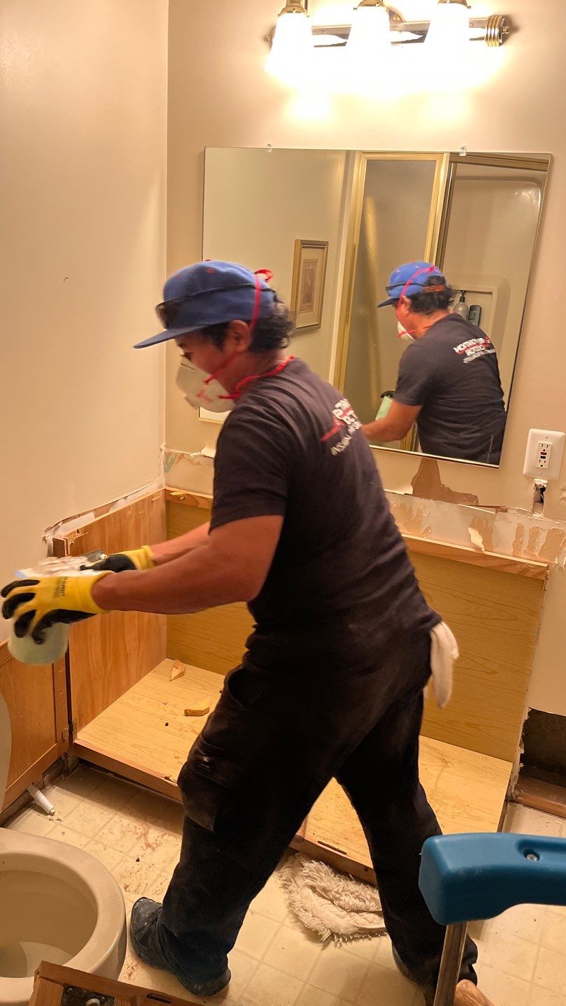 Final sanitizing application to treated surfaces following water extraction and structural drying completion.