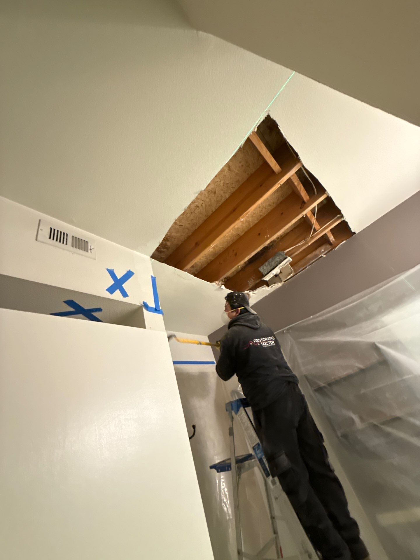New drywall installed to restore wall integrity in Fairfax.