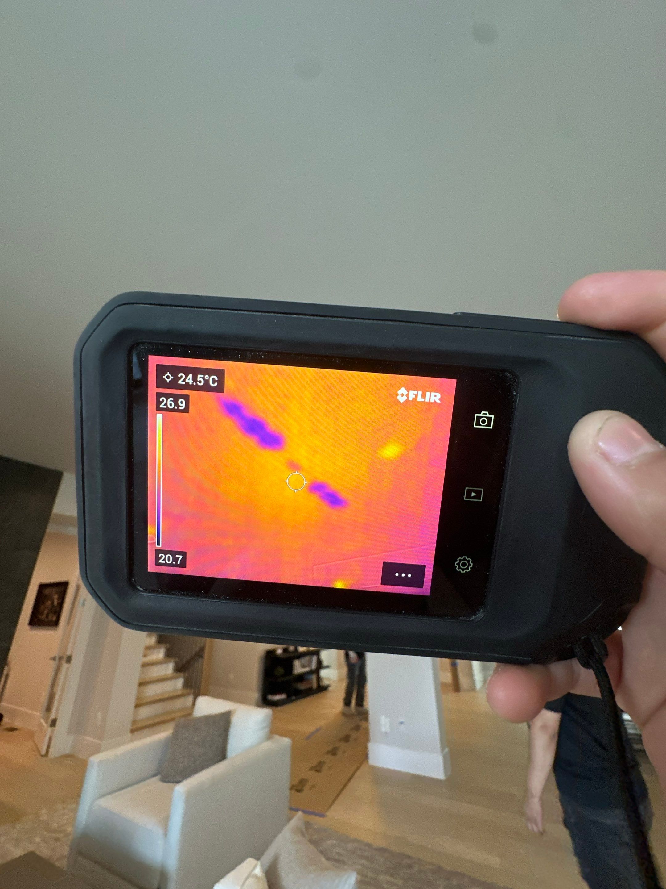 Drying equipment positioned to address residual moisture in subfloor and structural cavities.