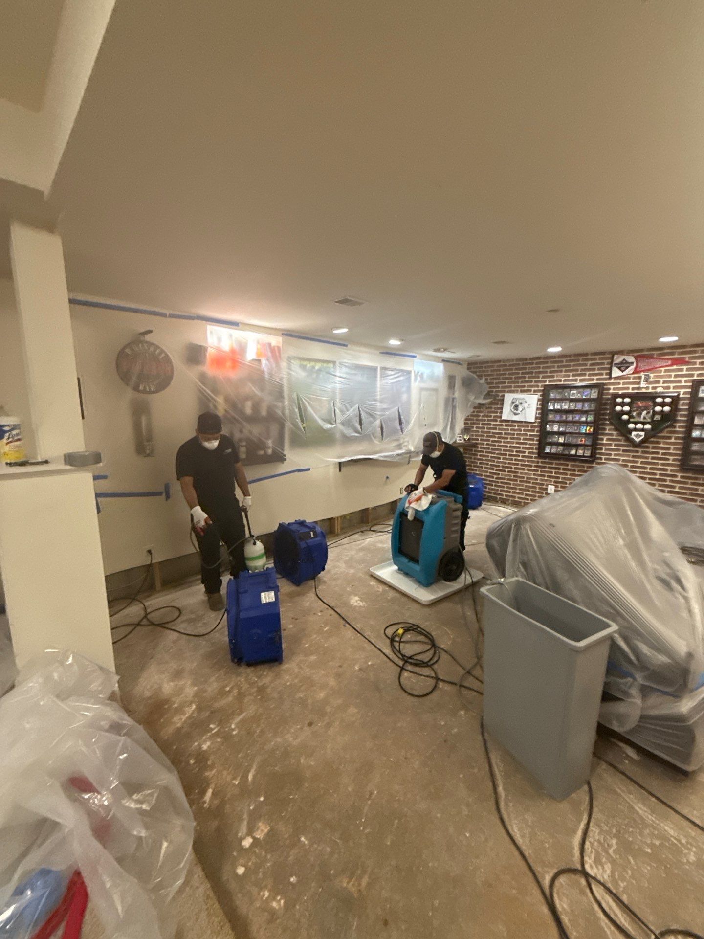 Flooring inspection and documentation during mold remediation process.