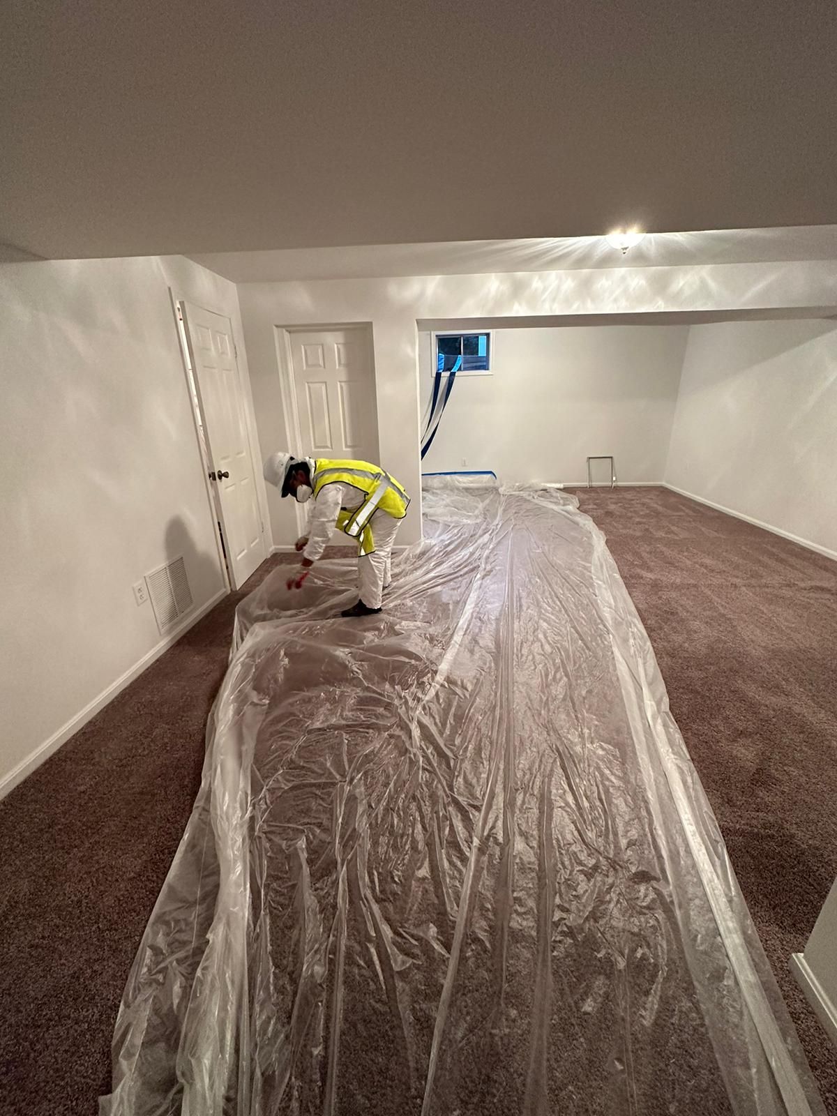 Final inspection of flooring and structural areas after water extraction and dehumidification.