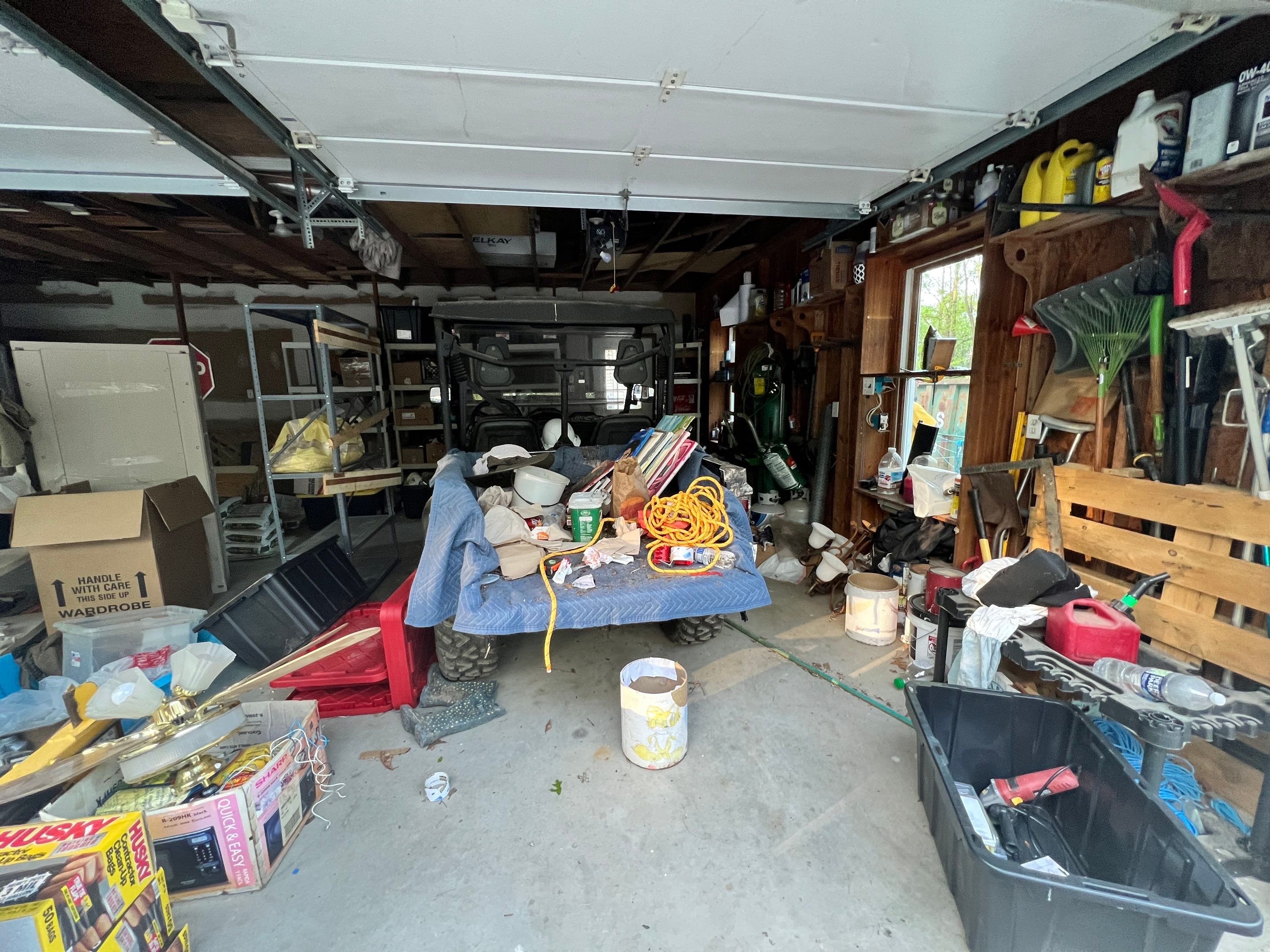 Ceiling damage assessment and preparation for repair during remediation work.