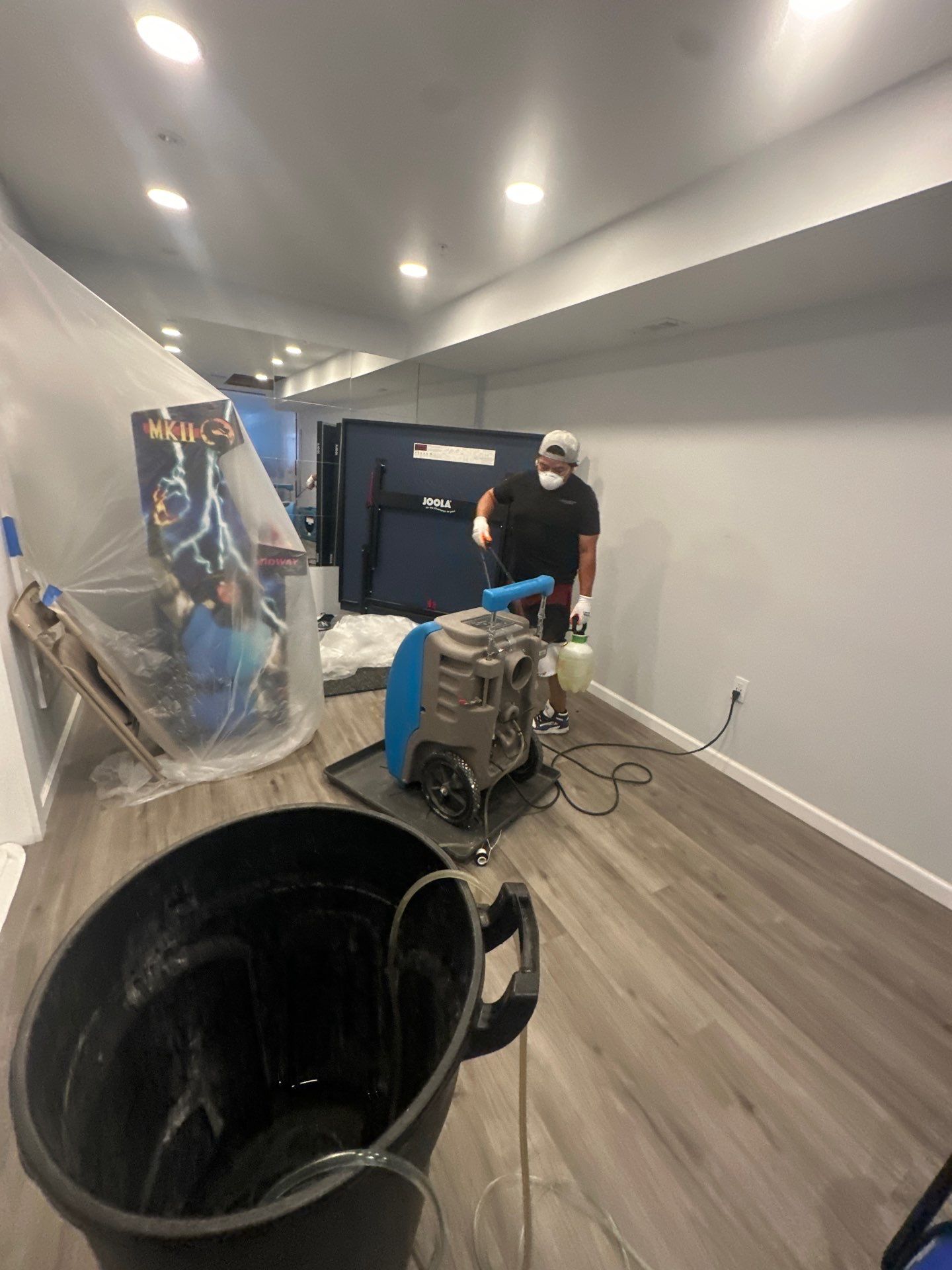 Continued drying operations with equipment adjustment in Washington water restoration.