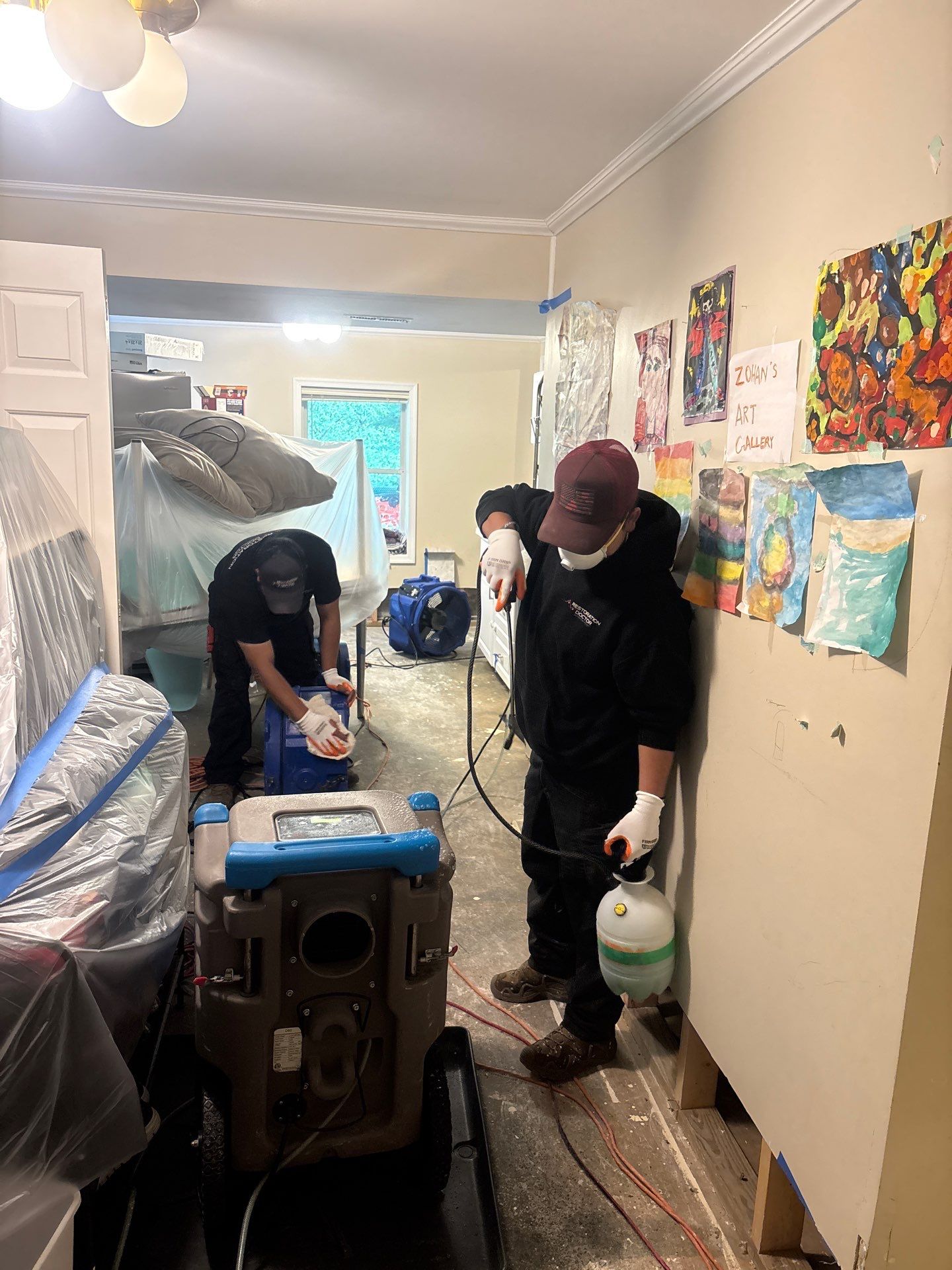 Thermal imaging camera documenting moisture distribution in Potomac water damage restoration.