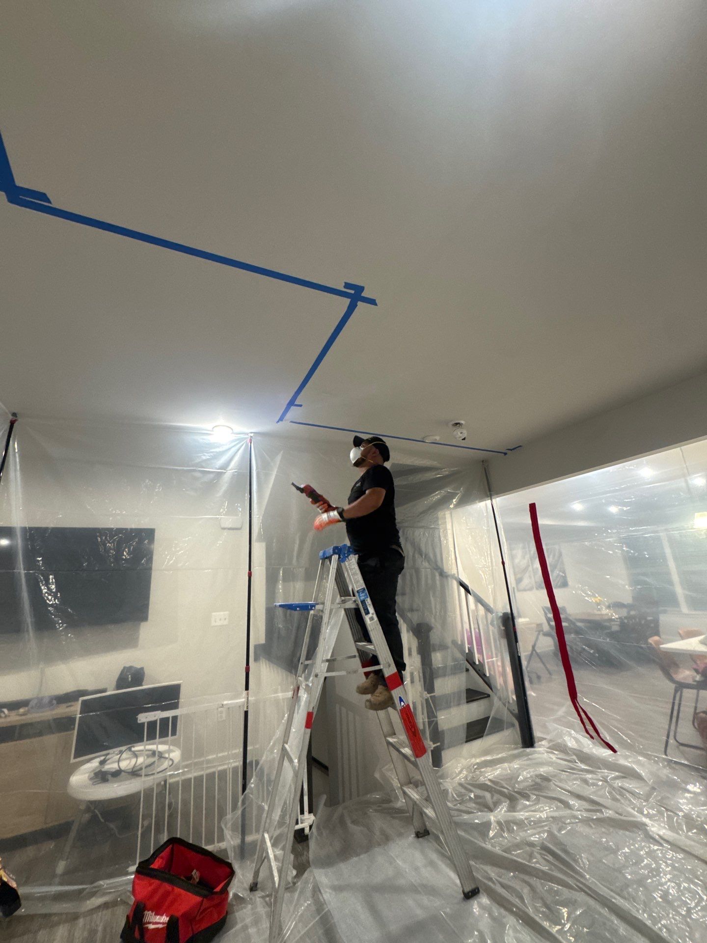 Ceiling damage exposed and prepared for repair as part of mold remediation scope.