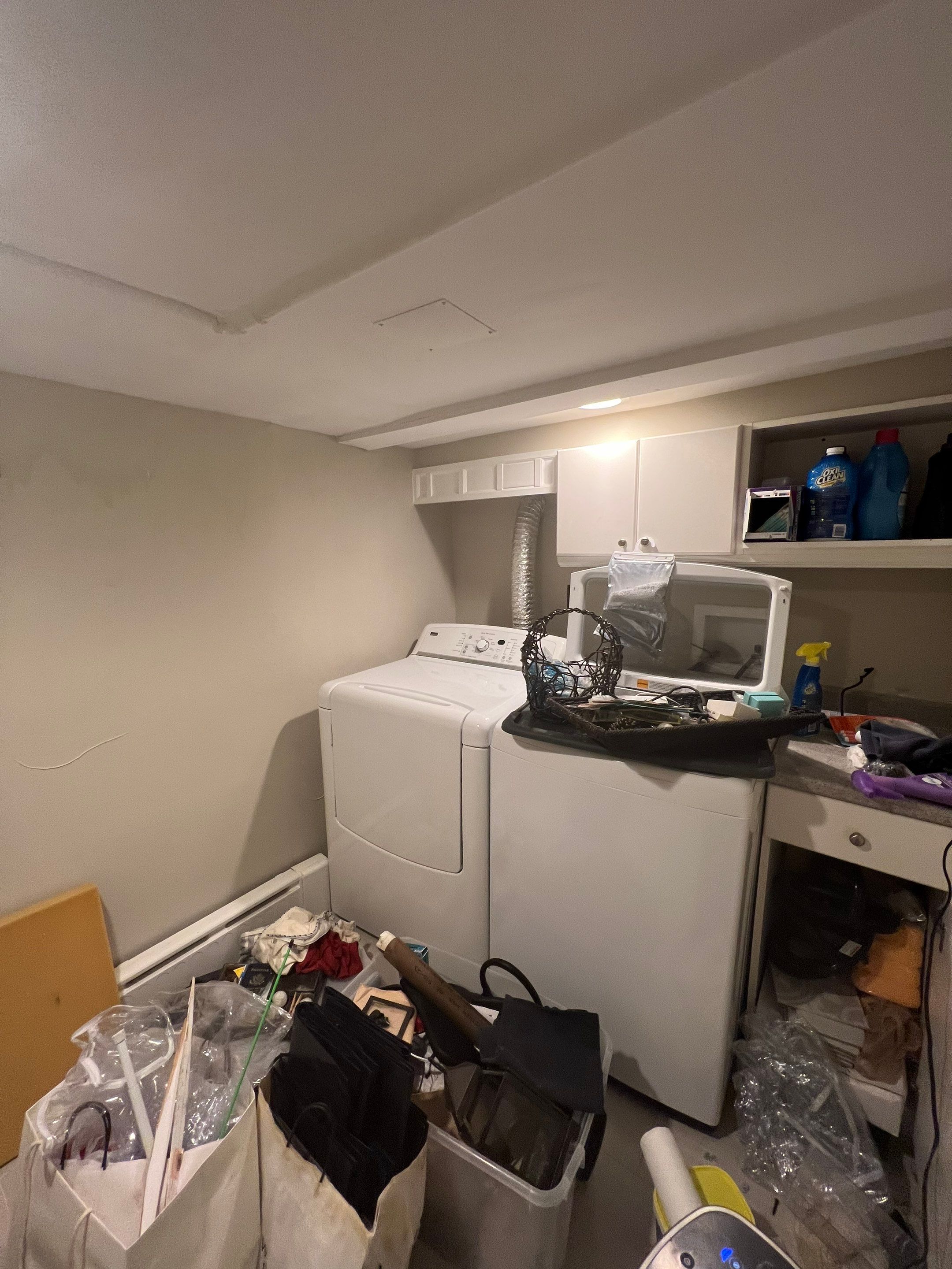 Dehumidifiers and air movers positioned throughout affected space during structural drying phase.