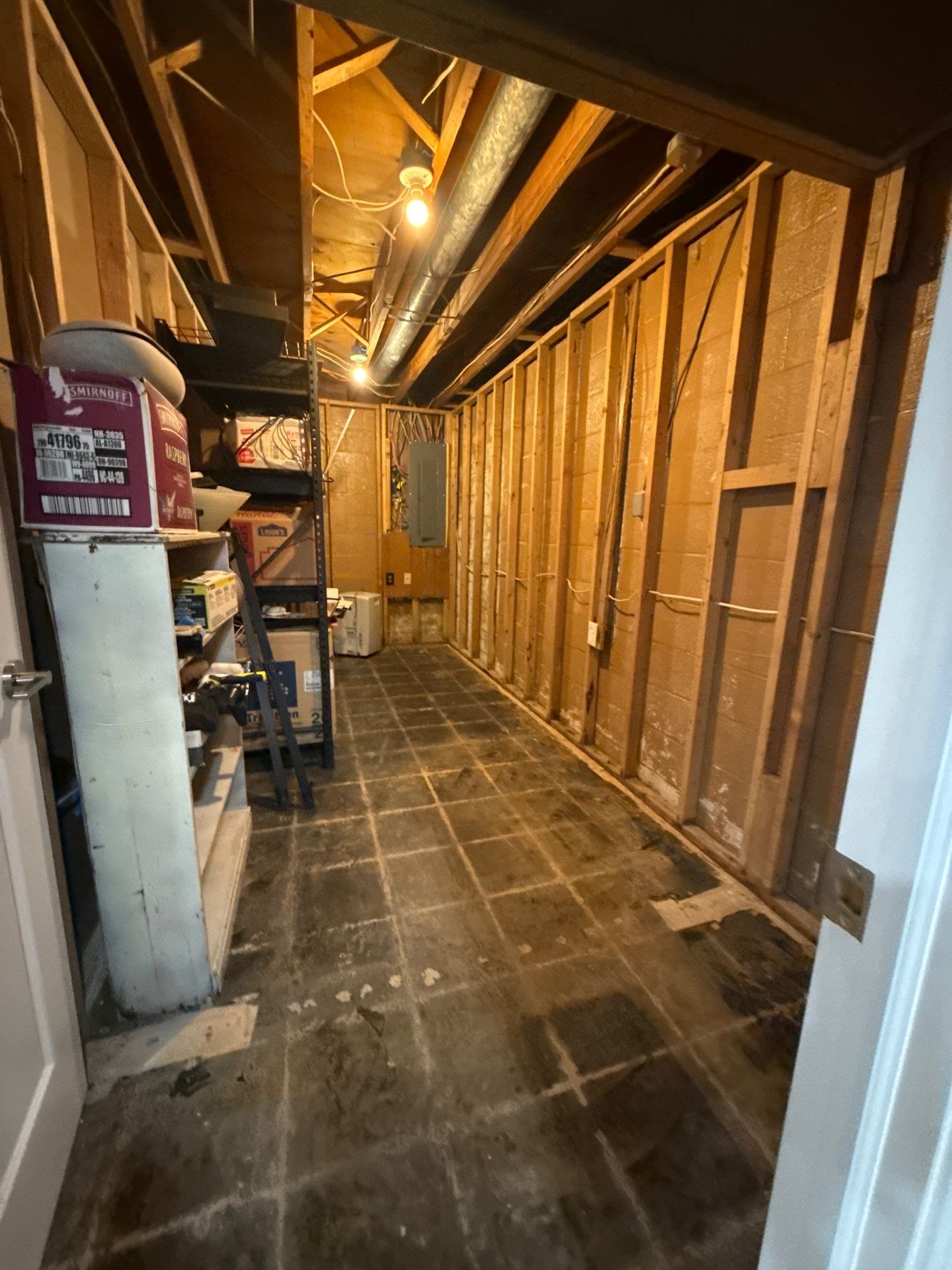 Remediation complete with structural drying finished and flooring removal documented.