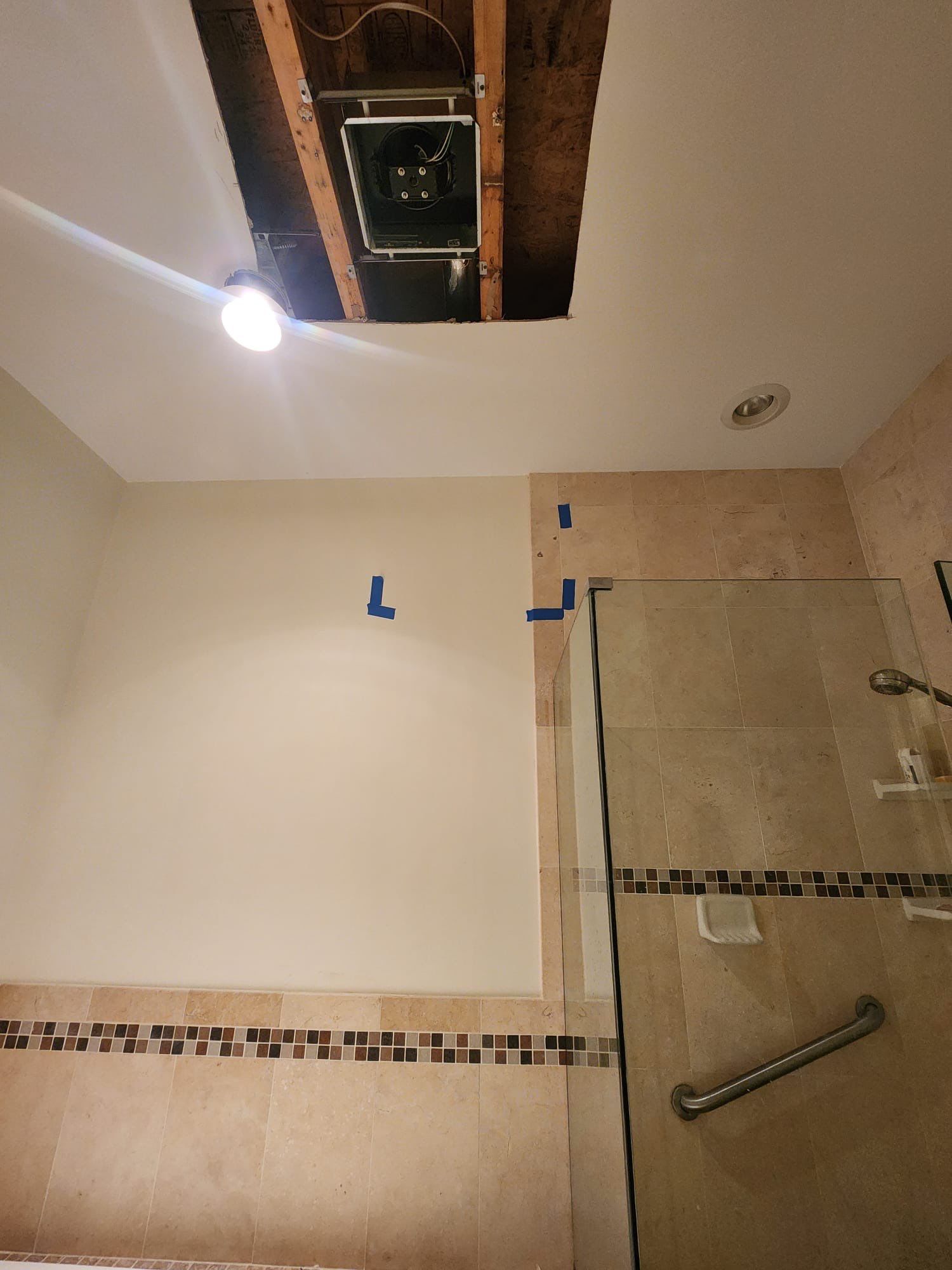 Dehumidifiers and air movers positioned for structural drying phase of mold remediation work.