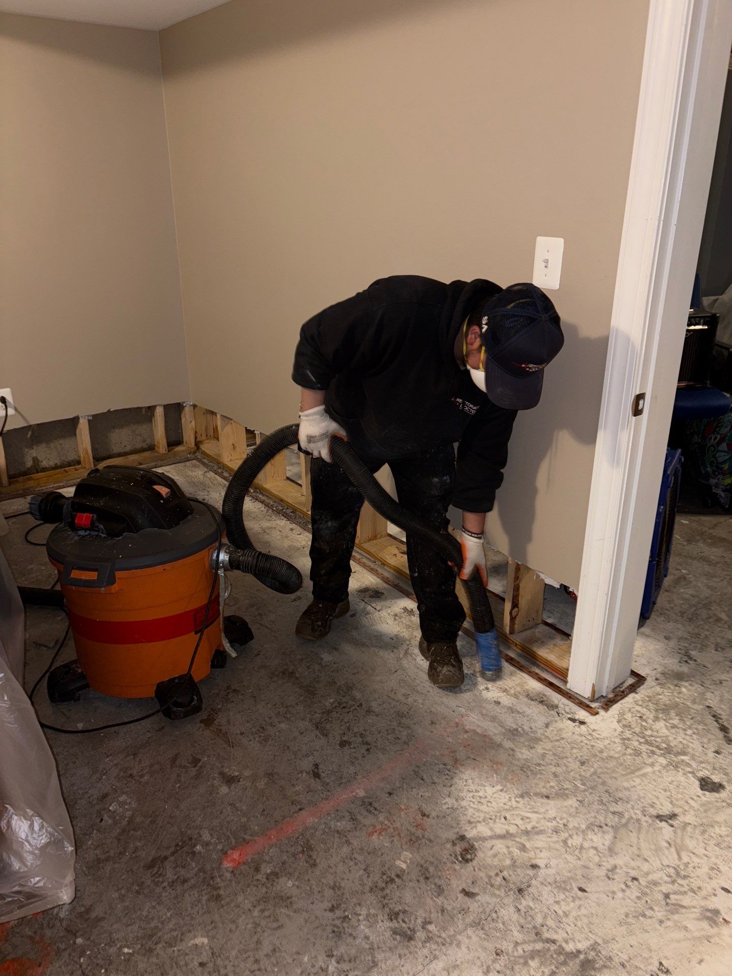 Standing water extraction underway during mold remediation in Plata, Virginia.