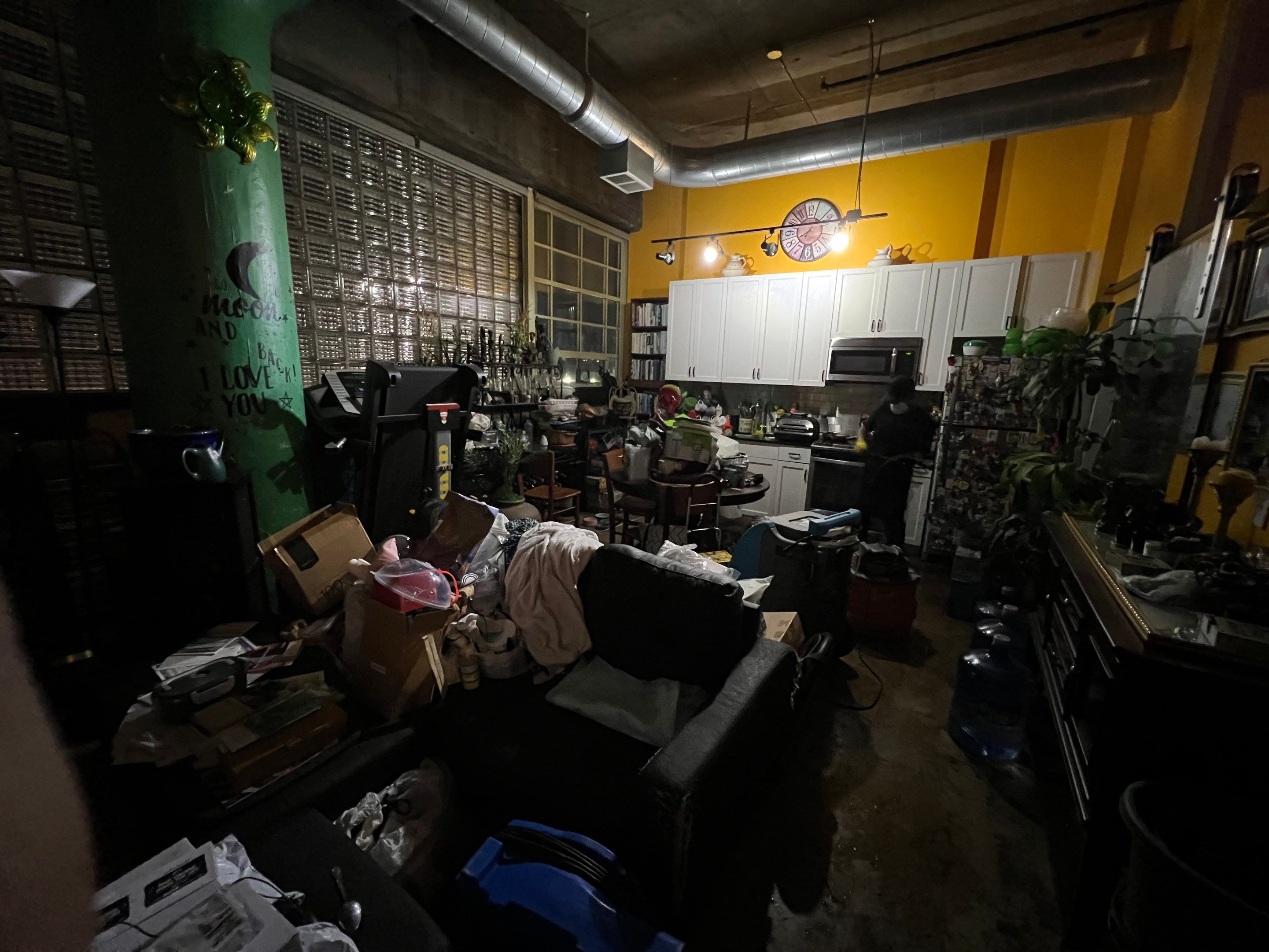 Extraction equipment removing water from affected interior spaces during restoration work.