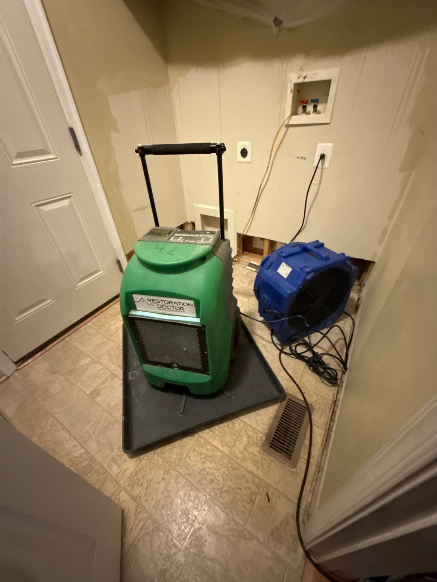 Wall surface prepared and sanitized as part of remediation process.