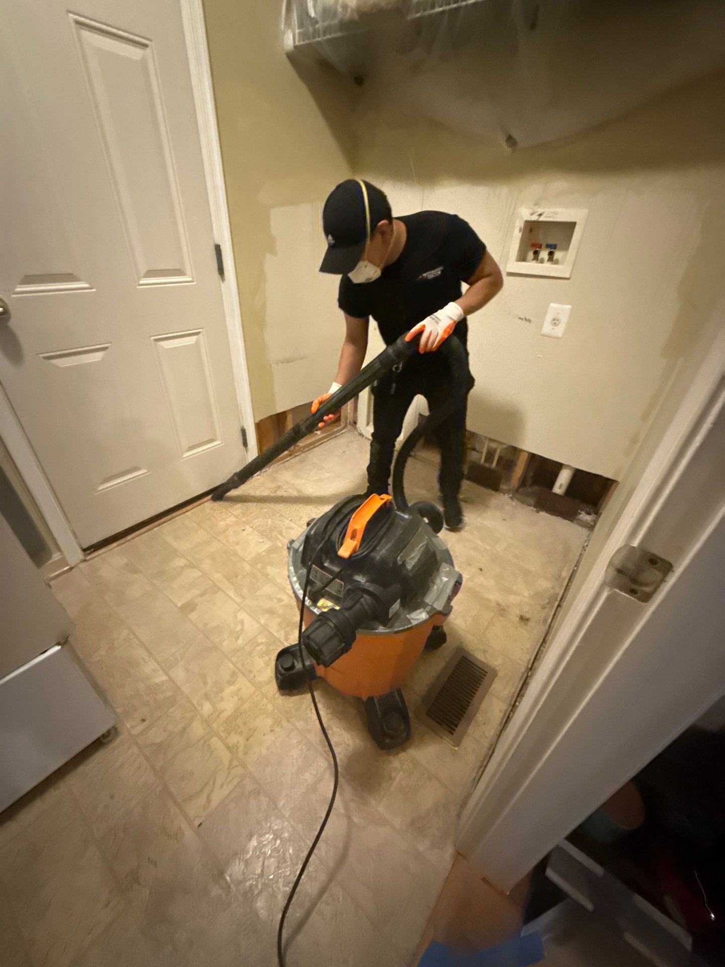 Completed baseboard replacement and wall restoration following mold remediation in Bowie.