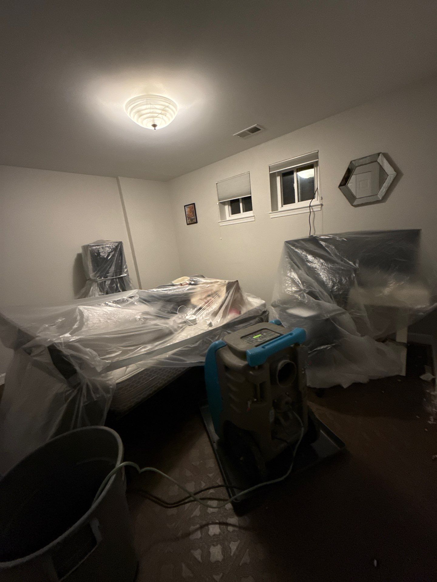 Thermal imaging inspection reveals moisture distribution across ceiling framing during Rockville water damage assessment.