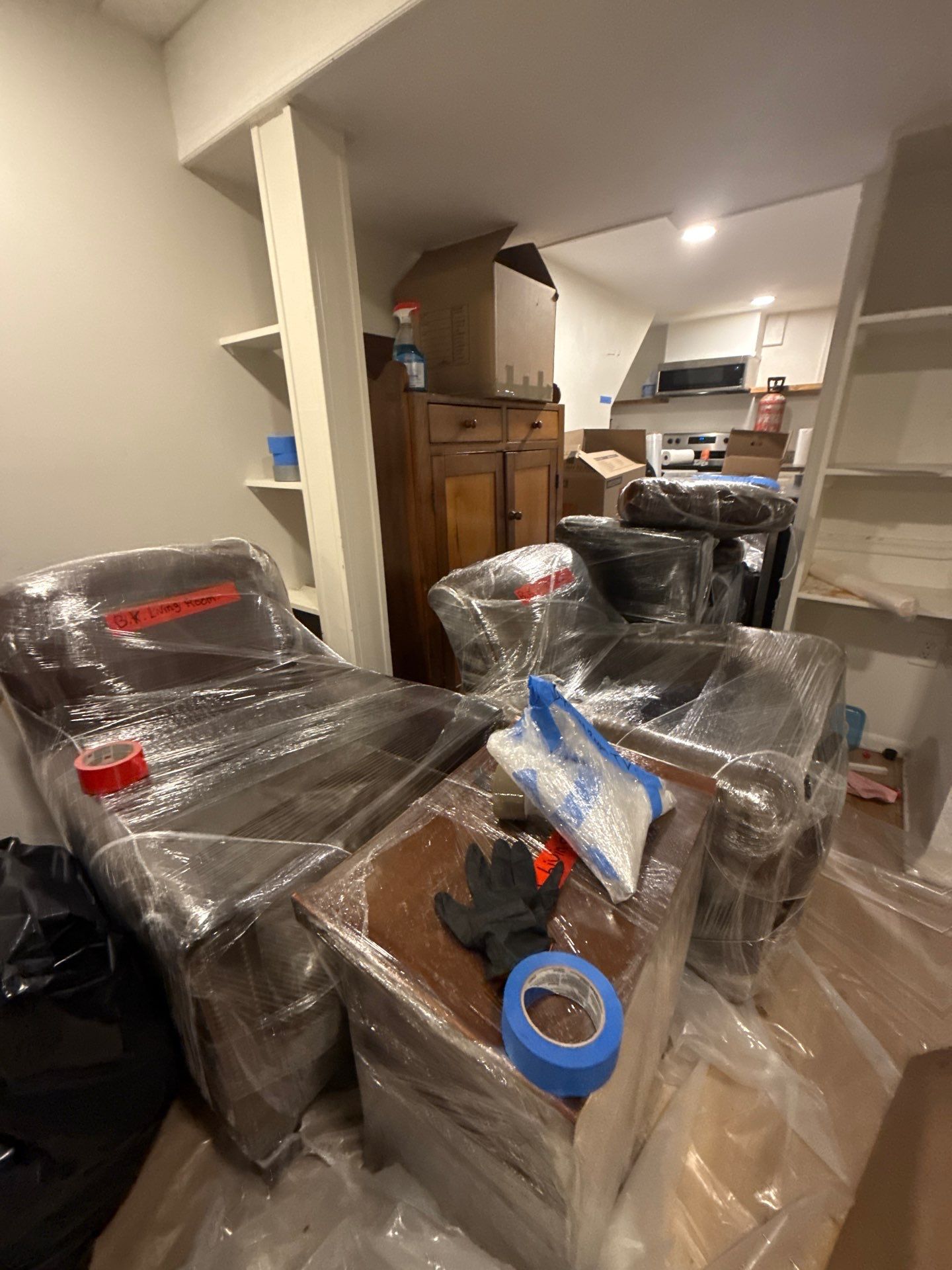 Water damage restoration crew securing and inventorying household contents in Silver Spring before drying begins.