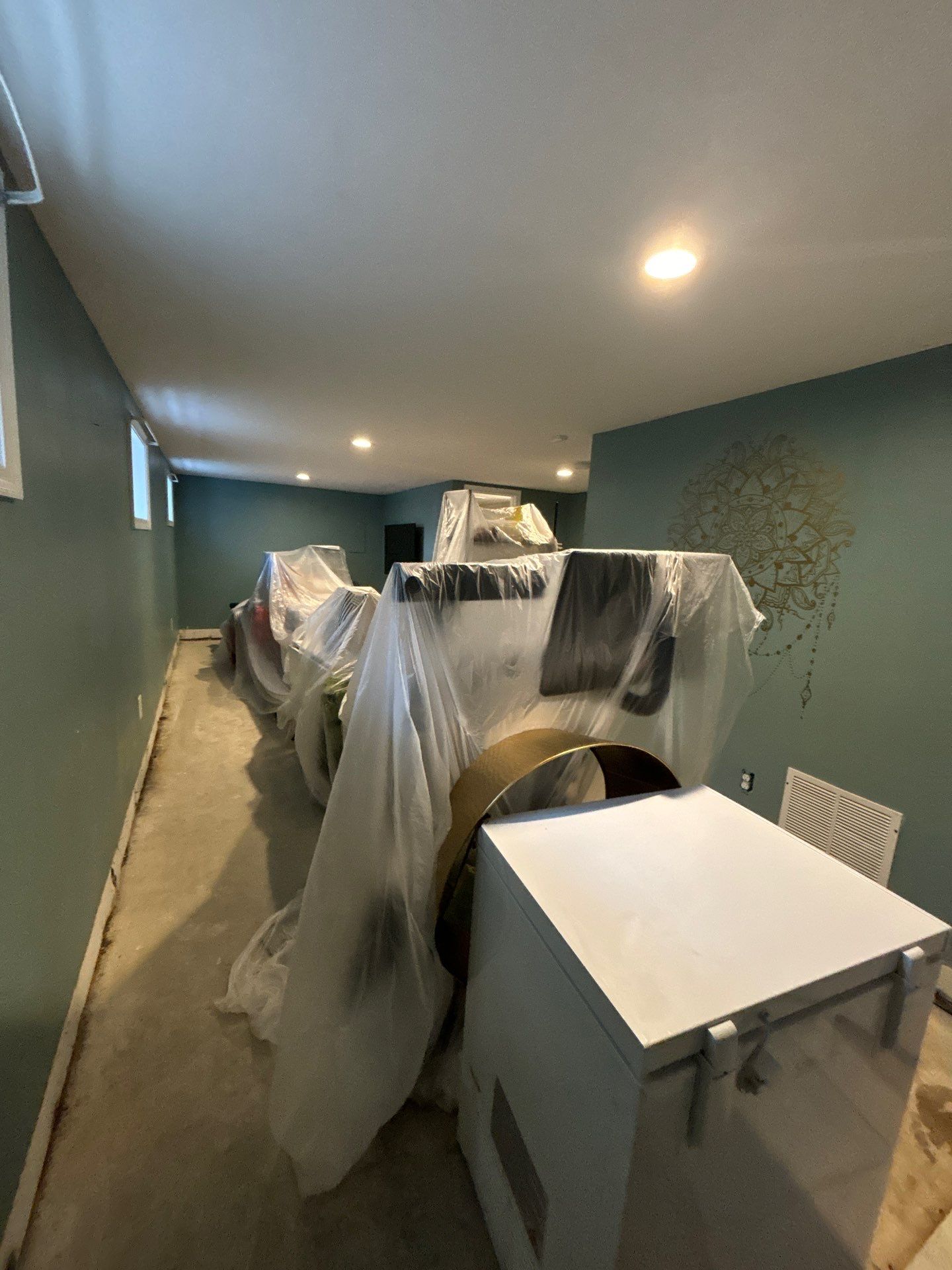 Completed ceiling repair following mold remediation and structural drying in Washington.