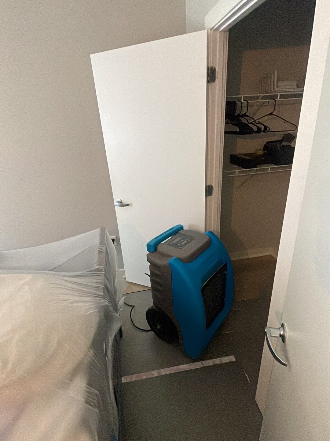 Structural drying equipment positioned to remove moisture from affected areas.