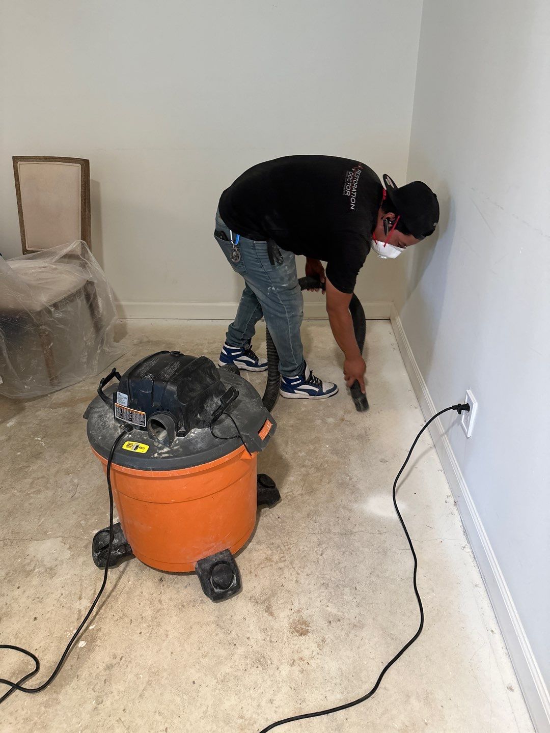 Structural drying equipment positioned throughout affected room during water damage restoration in Gaithersburg.
