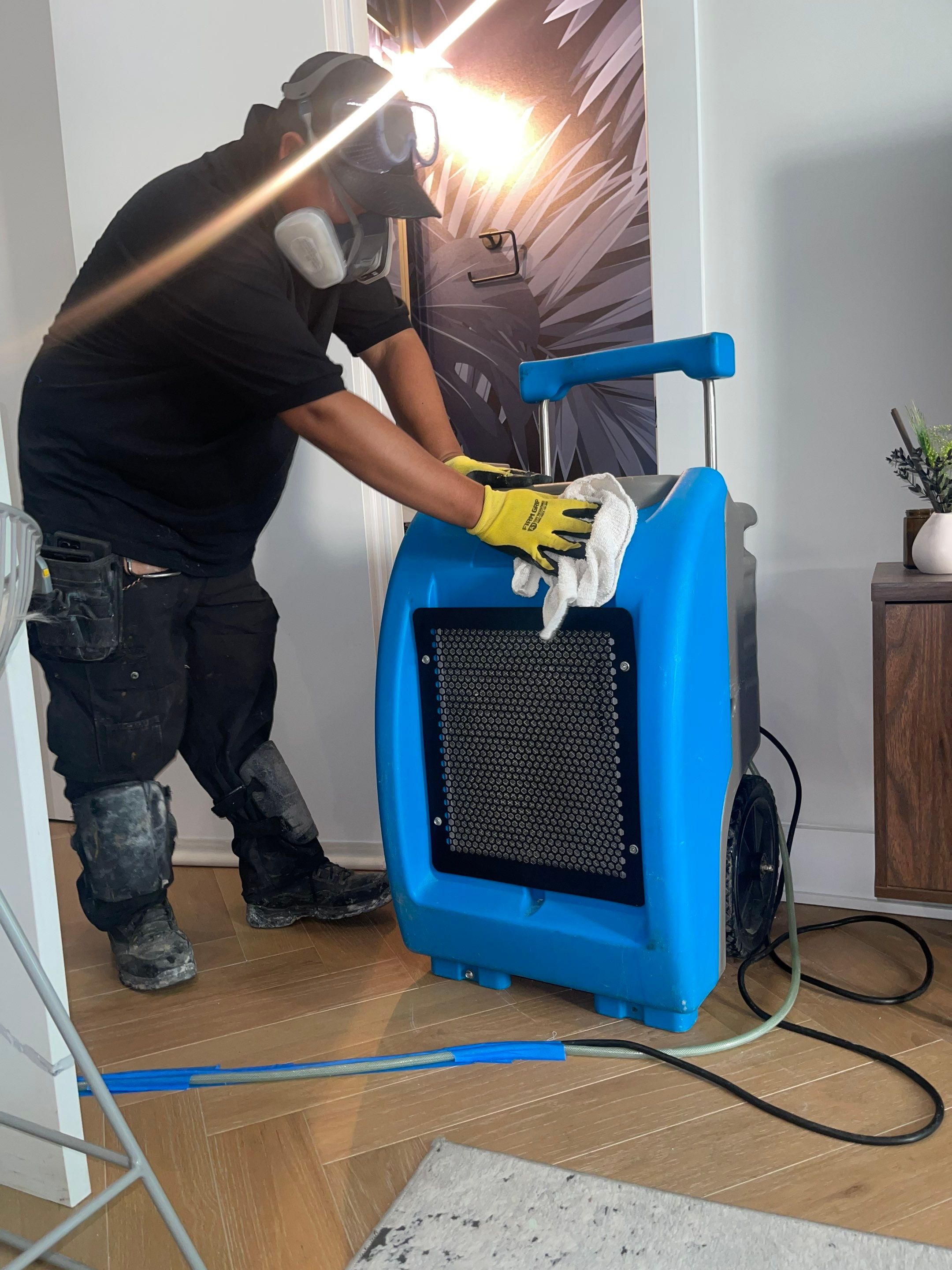 Completed ceiling repair and final drying verification in Washington water damage restoration.
