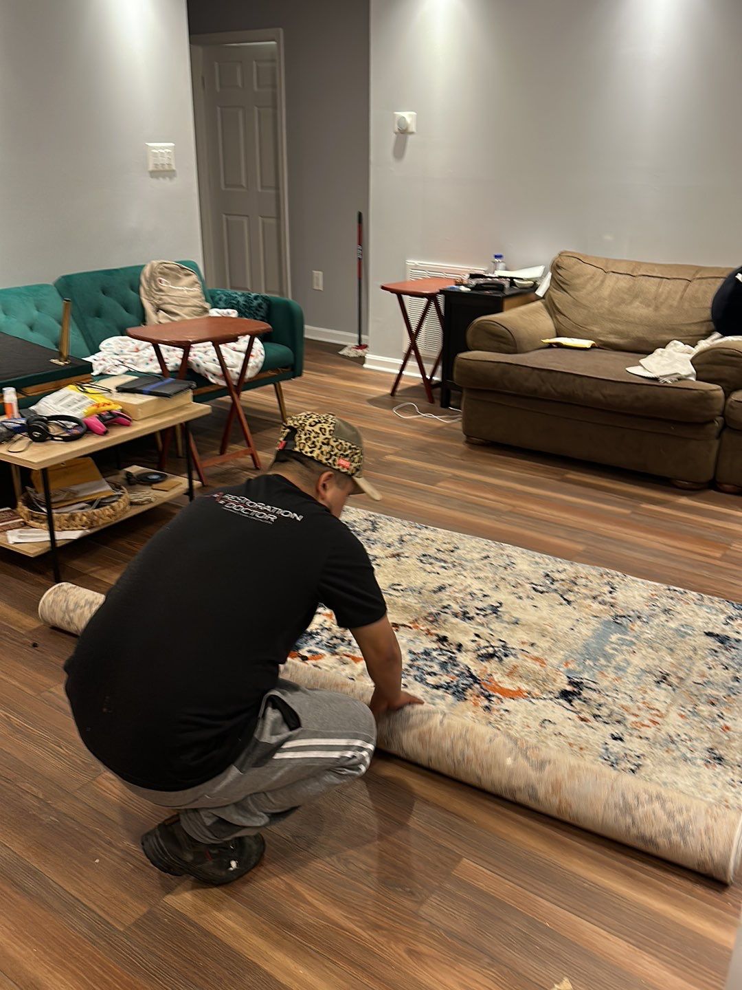 Continued dehumidification and air circulation during water damage restoration drying phase.