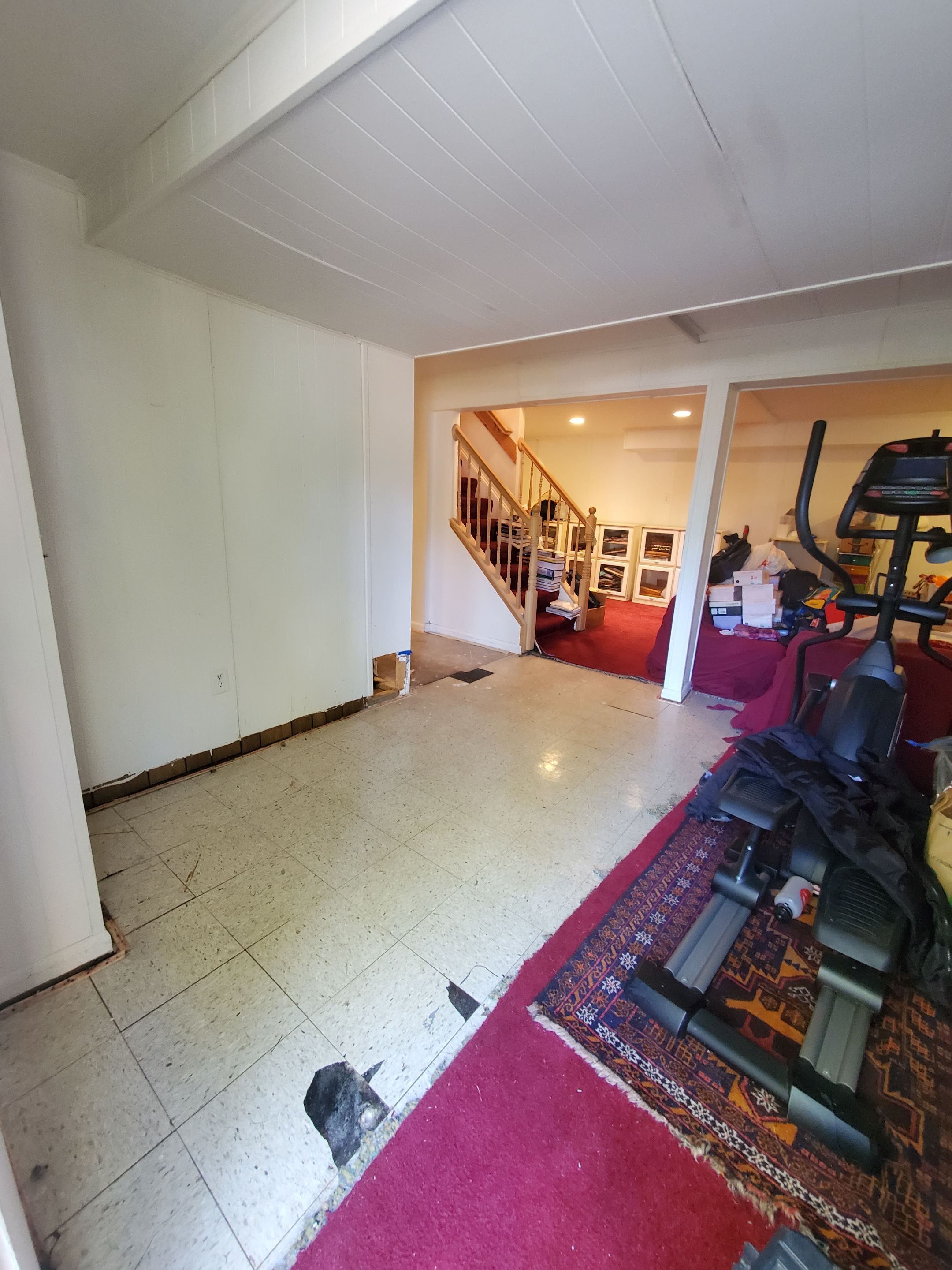 Ceiling damage assessment and preparation for repair phase of water restoration work.
