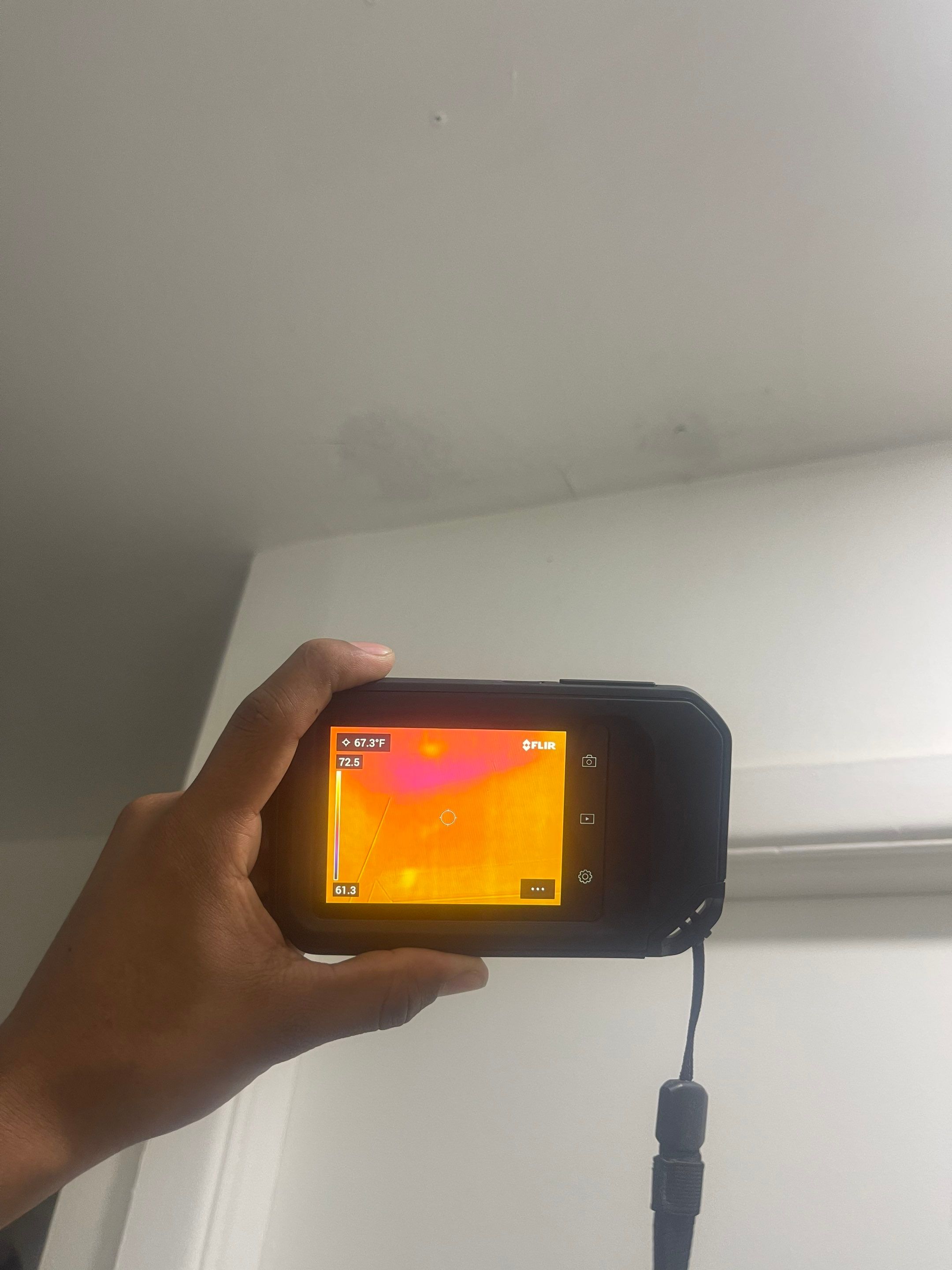 Structural drying in progress with air movers and dehumidifiers deployed across affected areas.
