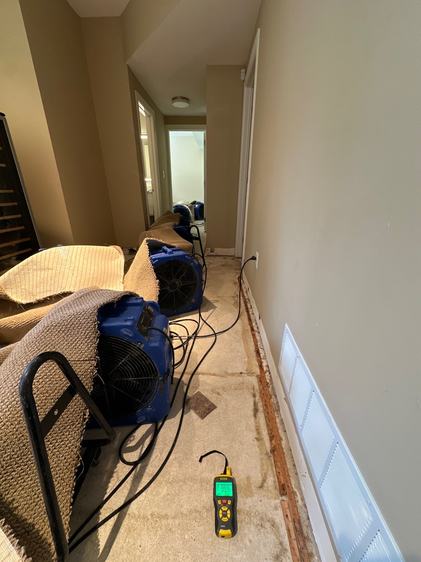 Dehumidifiers and air movers running to dry affected areas and prevent mold colonization.