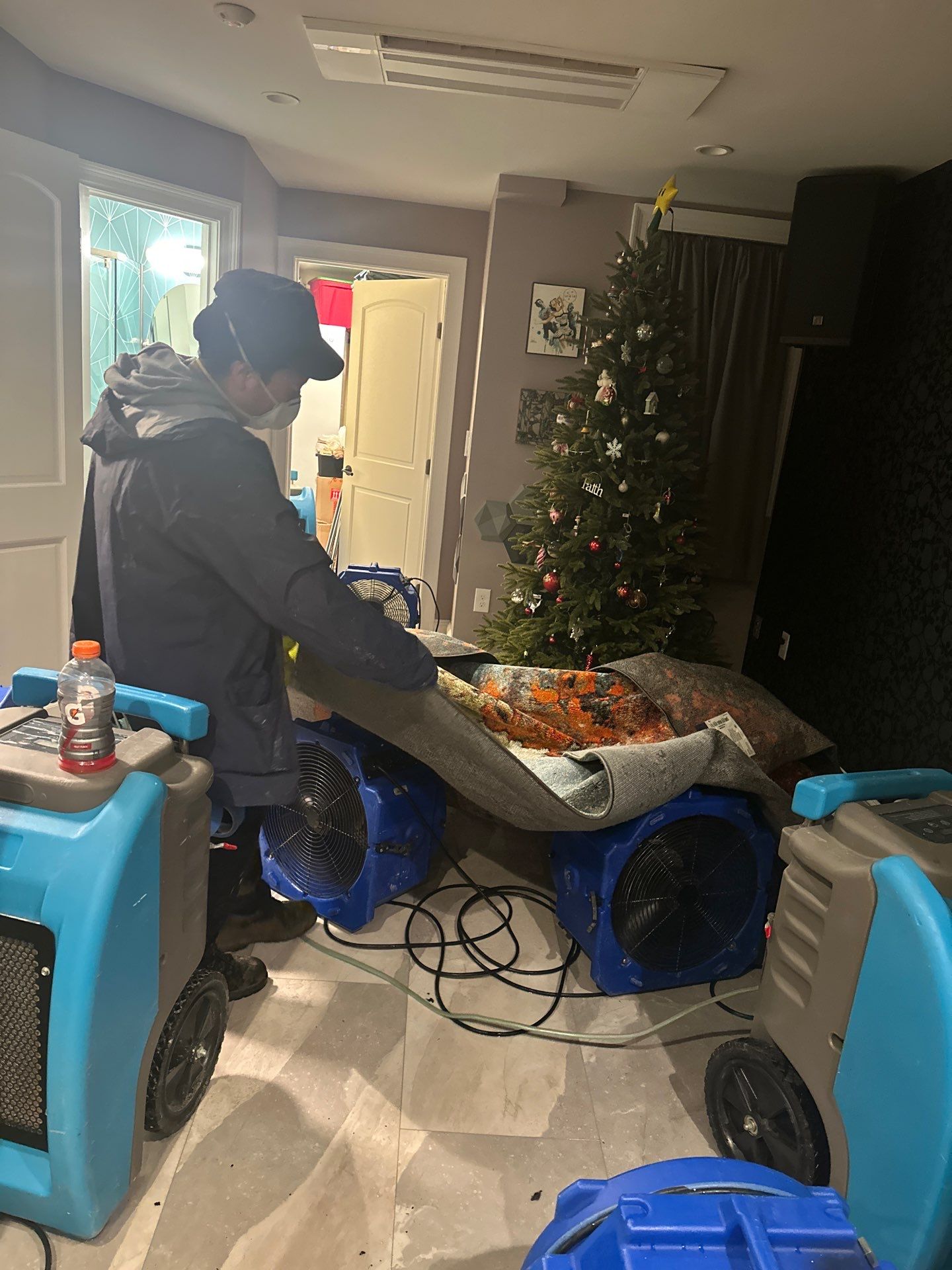 Dehumidifiers and air movers deployed across affected space during Washington water restoration process.