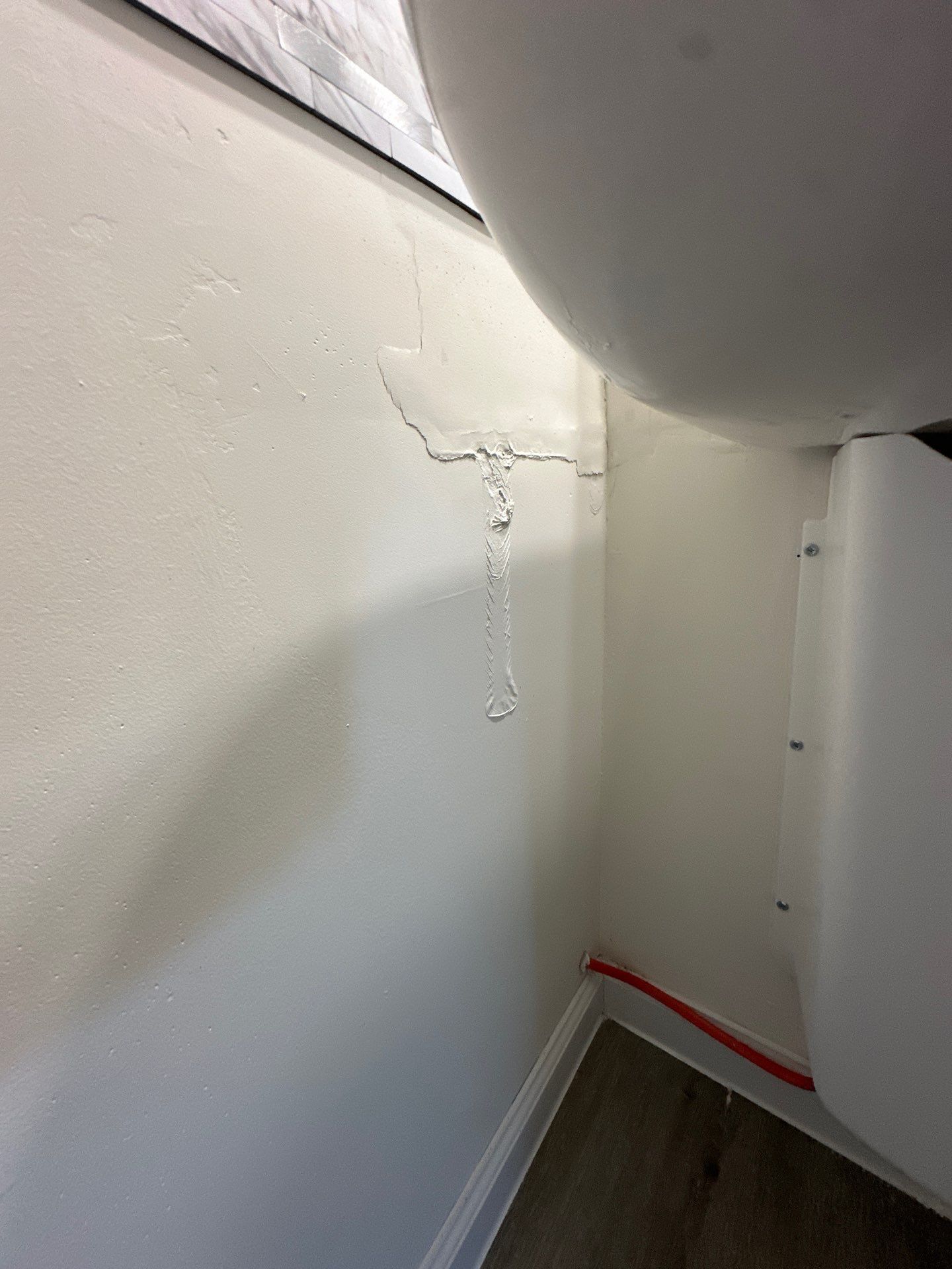 Drying equipment monitoring moisture levels in structural materials during restoration process.