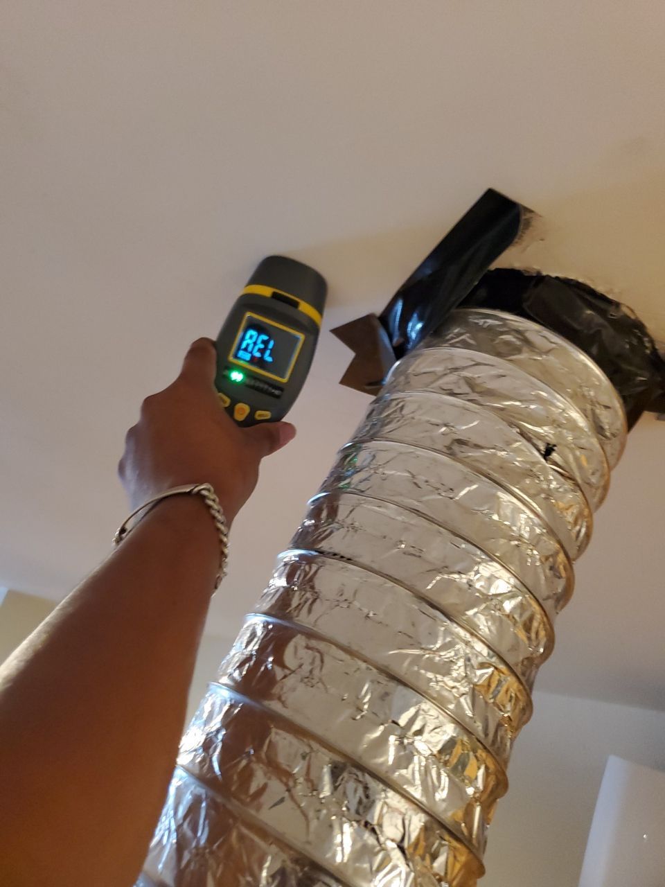 Wall cavity exposure and assessment during water damage restoration process in Washington.