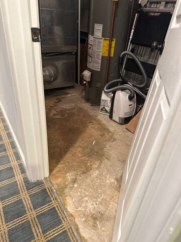 Dehumidification equipment operating in final drying phase of Kensington water damage restoration.