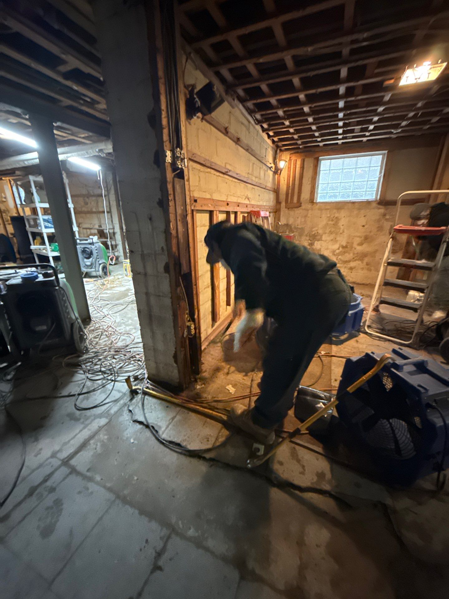 Continued structural drying with dehumidification systems in operation.