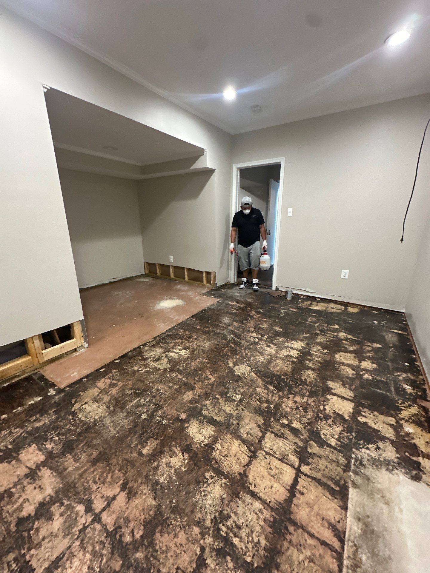 Structural drying in progress with equipment deployed to reduce moisture levels in flooring and substrate.