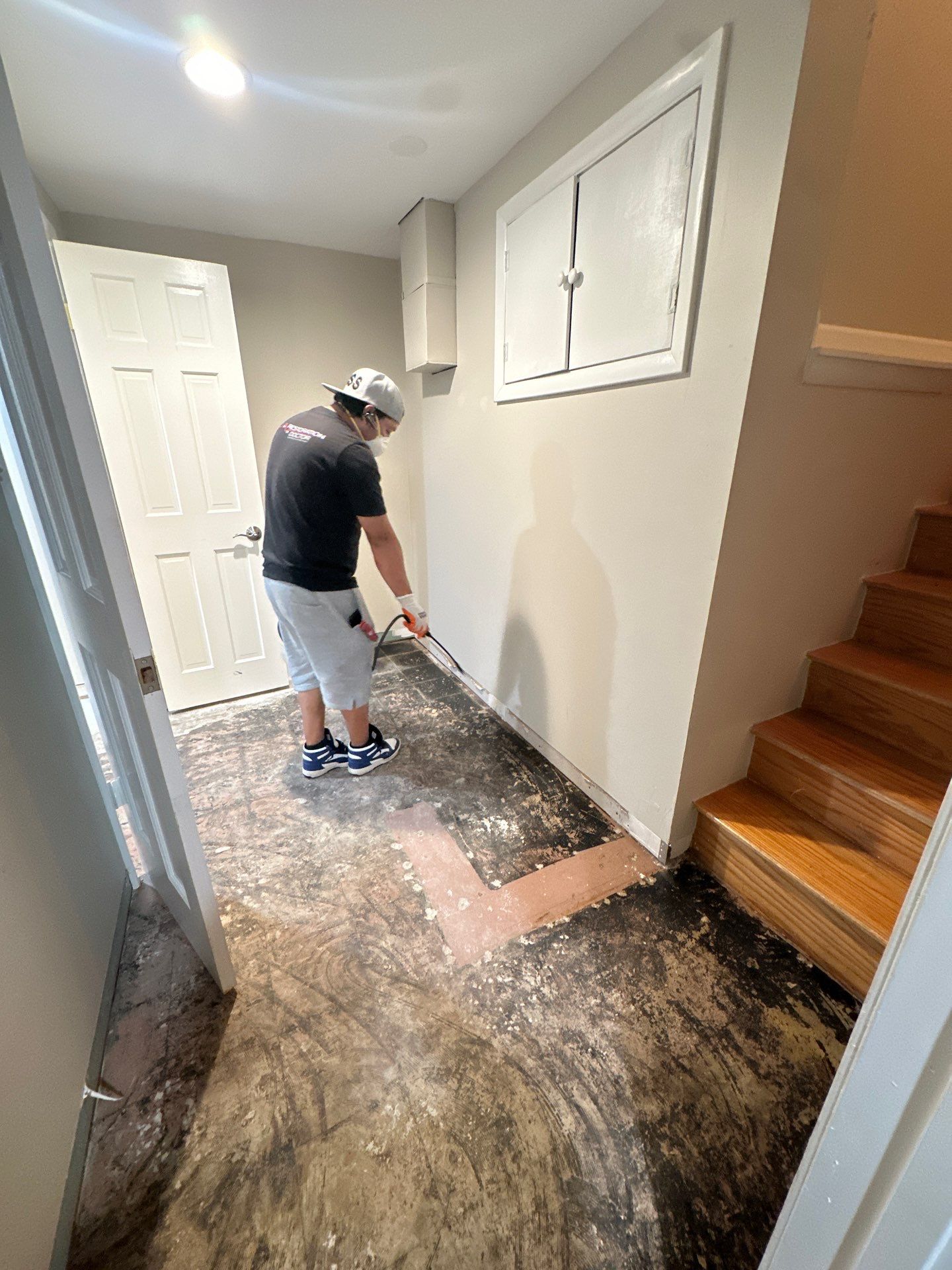 Final-stage mold remediation in Potomac with equipment removal after flooring and structural drying completion.