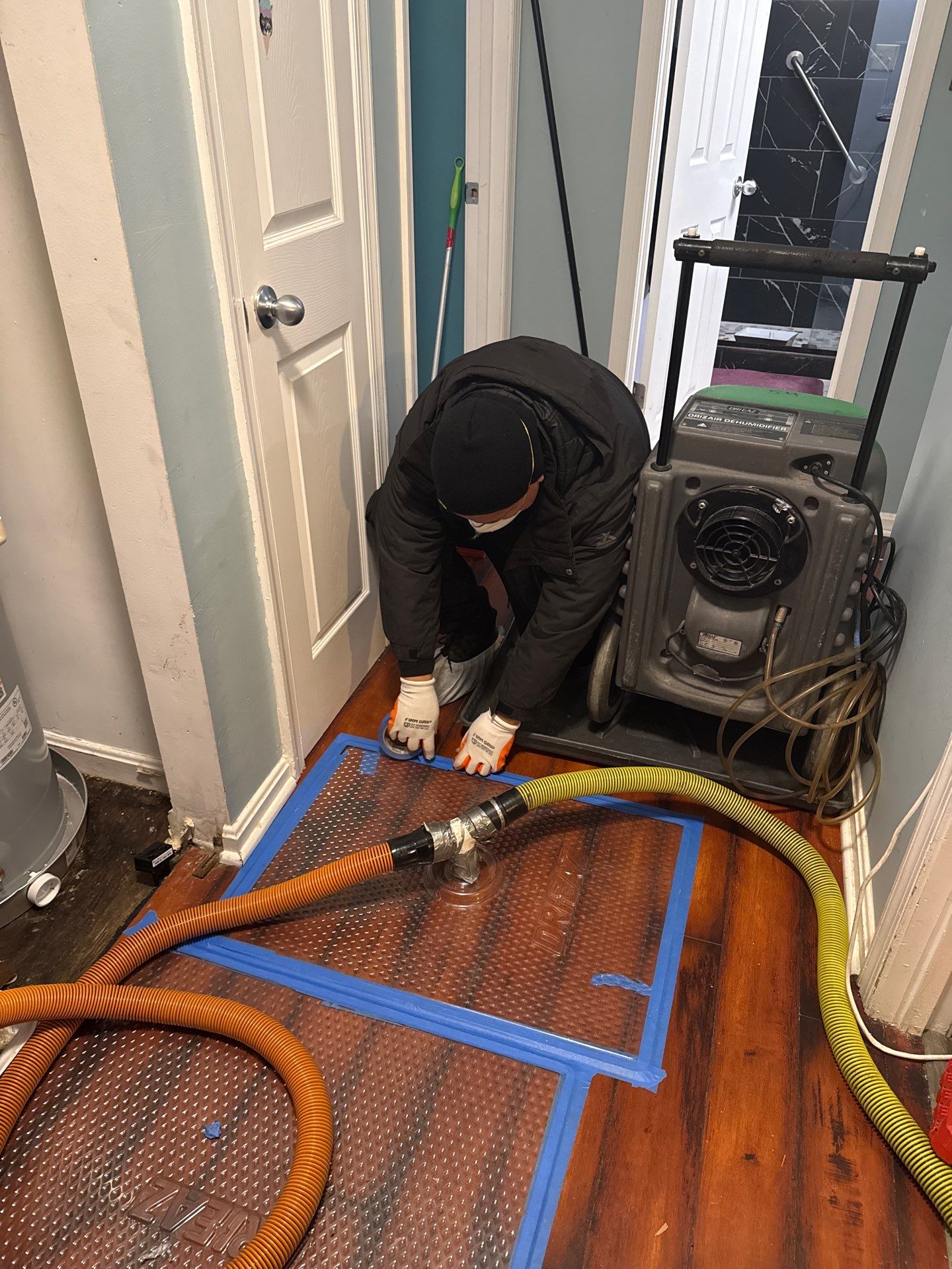 Final-phase drying with equipment monitoring moisture levels before containment removal.