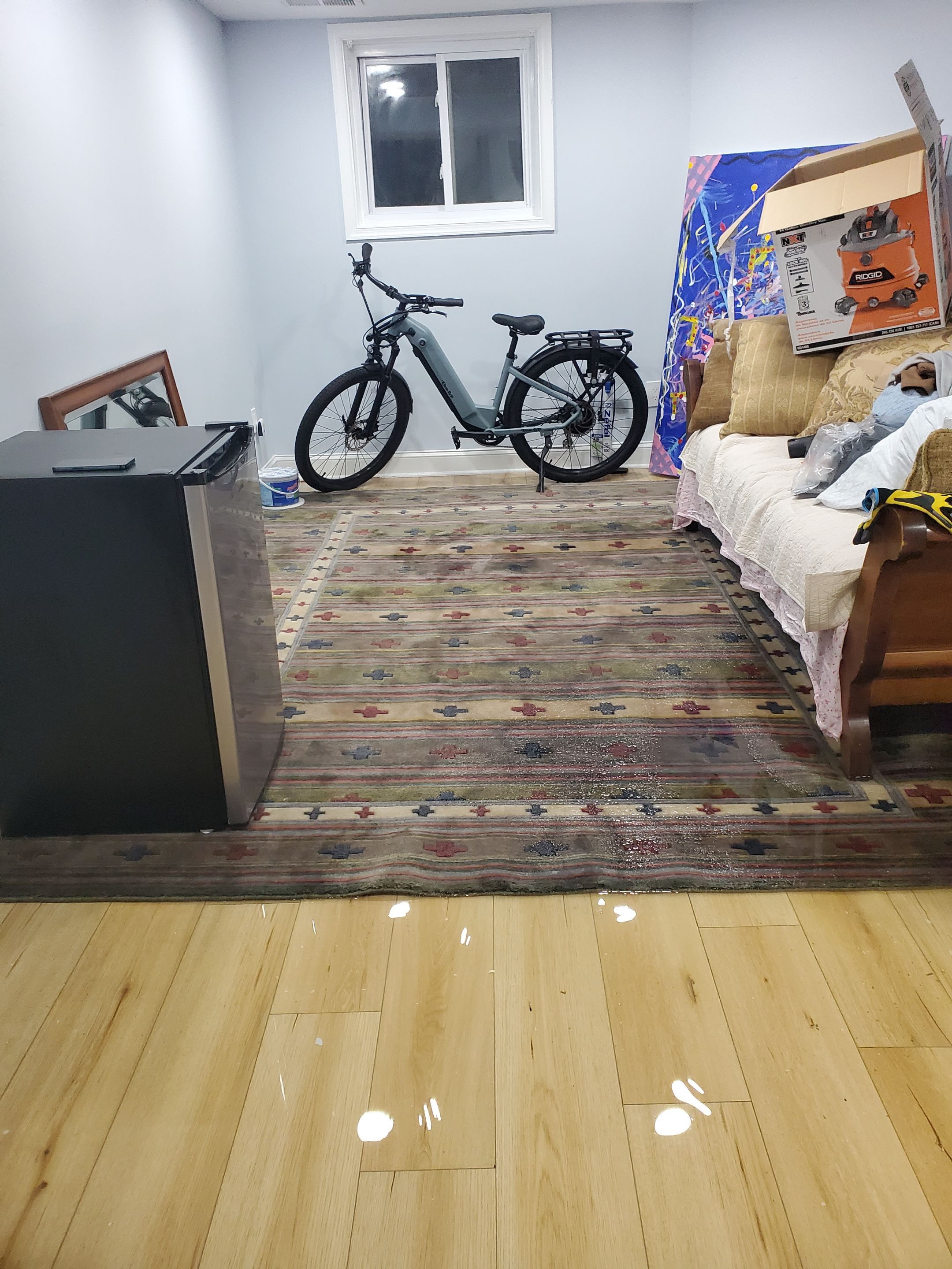 Ceiling damage assessment and preparation for repair during Washington water restoration work.
