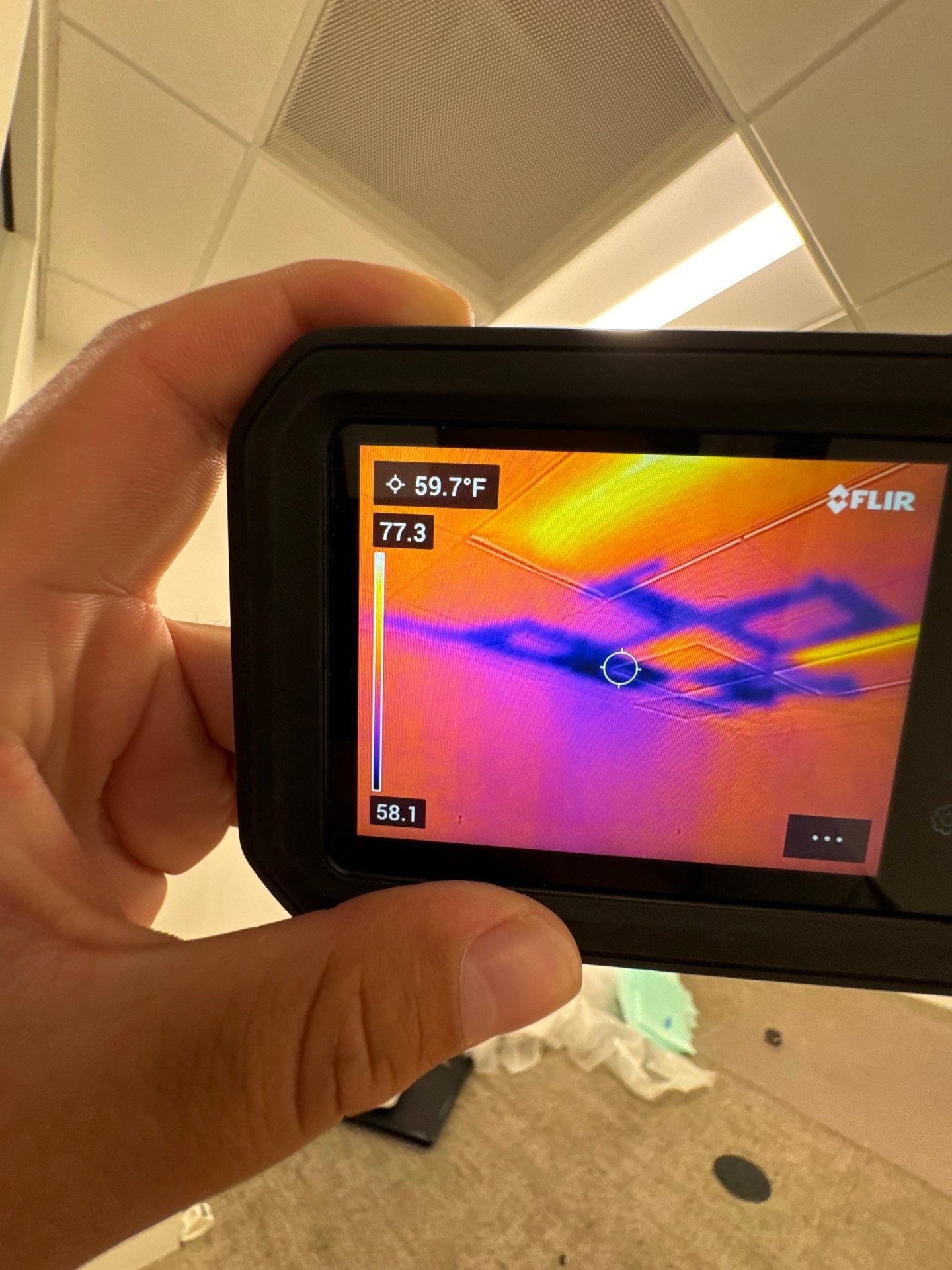 Moisture inspection mapping active drying zones in affected building materials.
