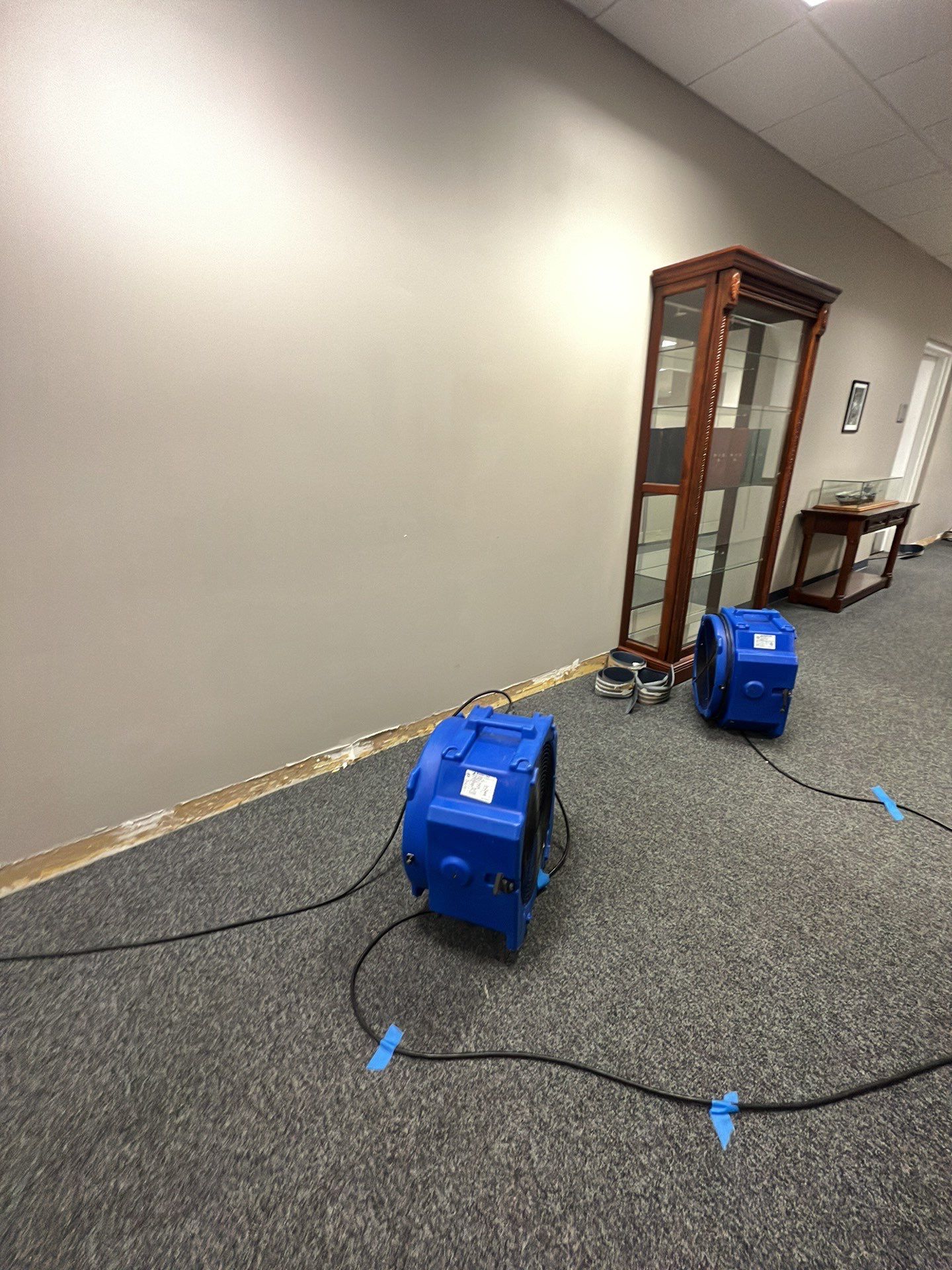 Final-stage drying verification after water damage restoration completion.