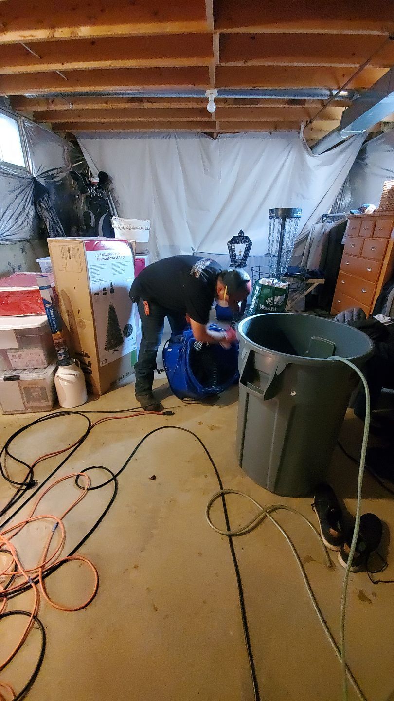 Dehumidifiers and air movers running to complete structural drying phase of restoration.