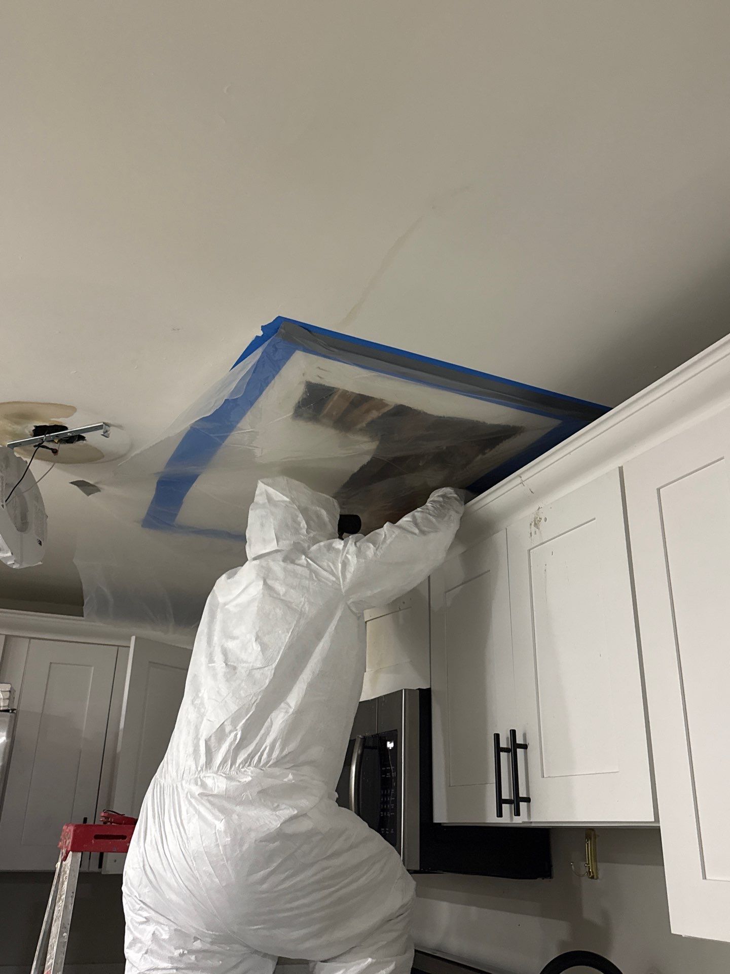 Final moisture readings confirm structural drying objectives met before ceiling repair.