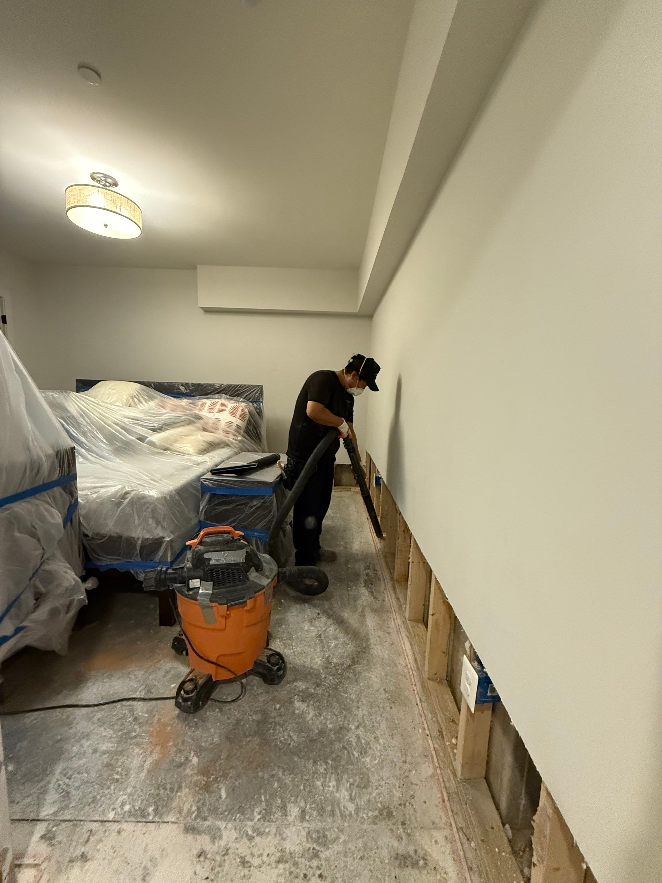 Affected wall section exposed and prepared for removal as part of structural remediation.