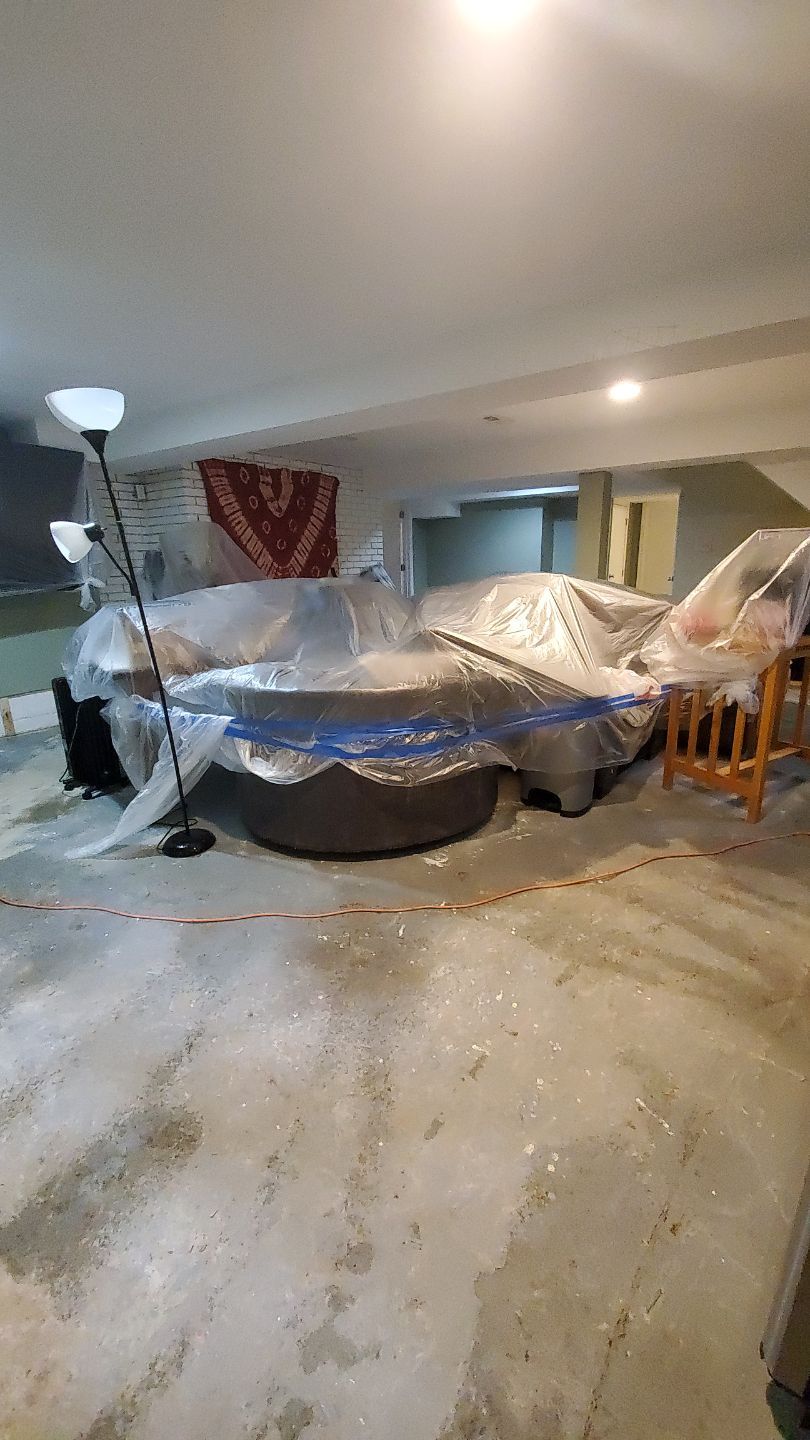 Dehumidification equipment positioned during structural drying phase of water damage restoration.