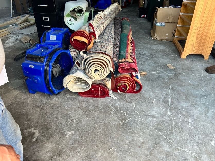 Structural drying equipment positioned during Frederick water damage mitigation process.