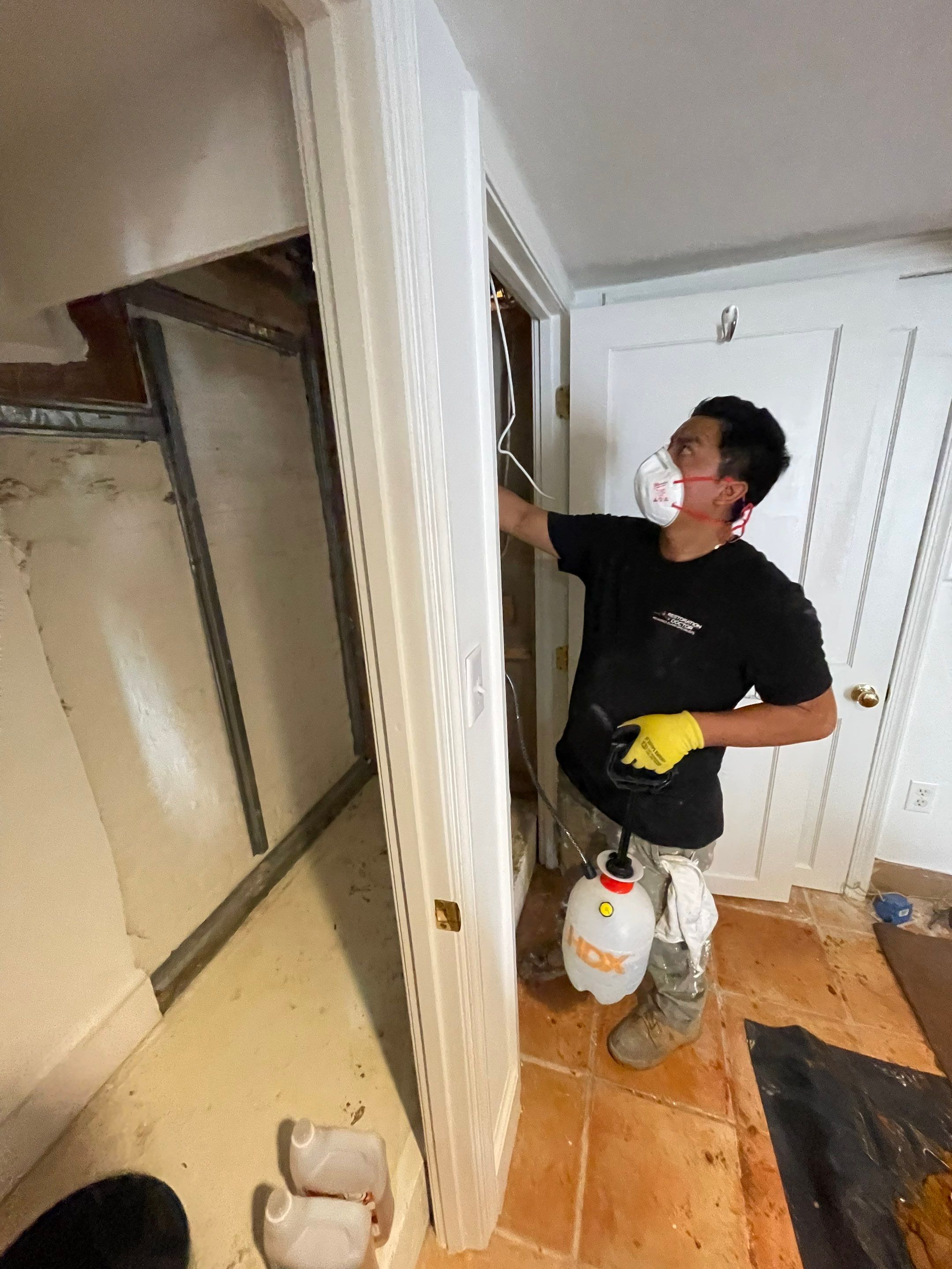 Final inspection of dried surfaces after water extraction and dehumidification completed the Washington restoration project.