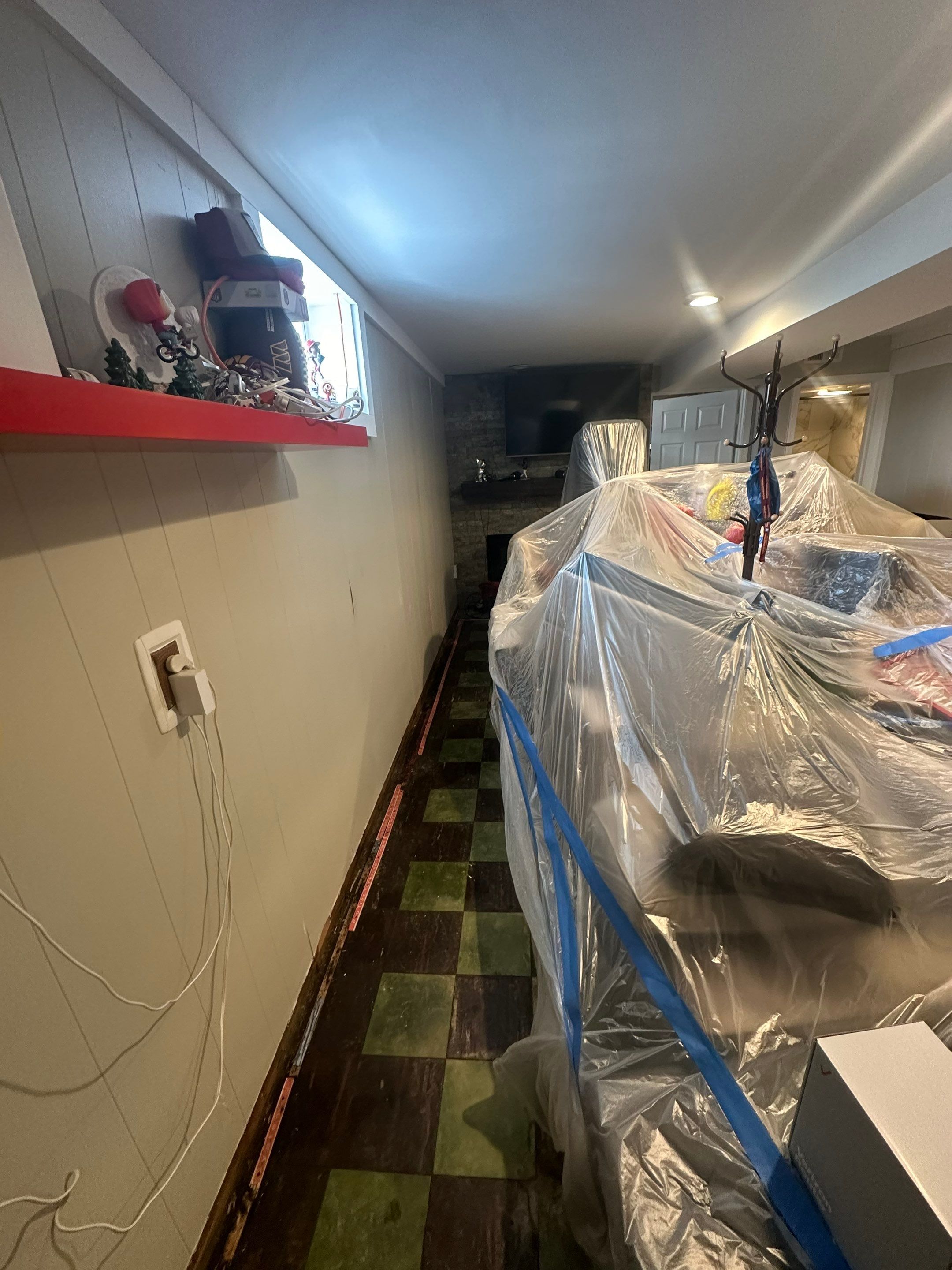 Final-stage water damage restoration in Washington showing cleared area and completed dehumidification phase.