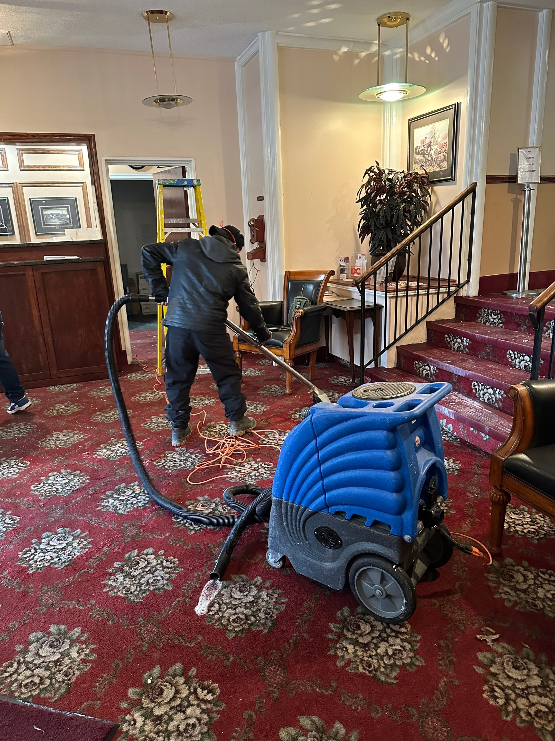 Dehumidifier and air movers deployed mid-restoration to manage moisture.