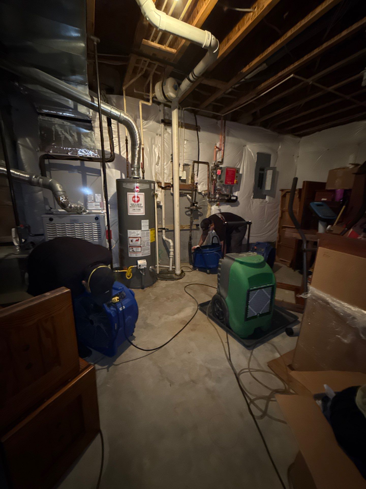 Dehumidification and air movement equipment positioned for structural drying phase.