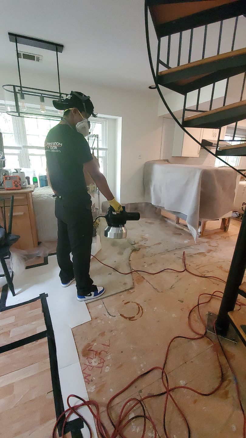 Dehumidification and air movement equipment deployed for structural drying during water restoration.
